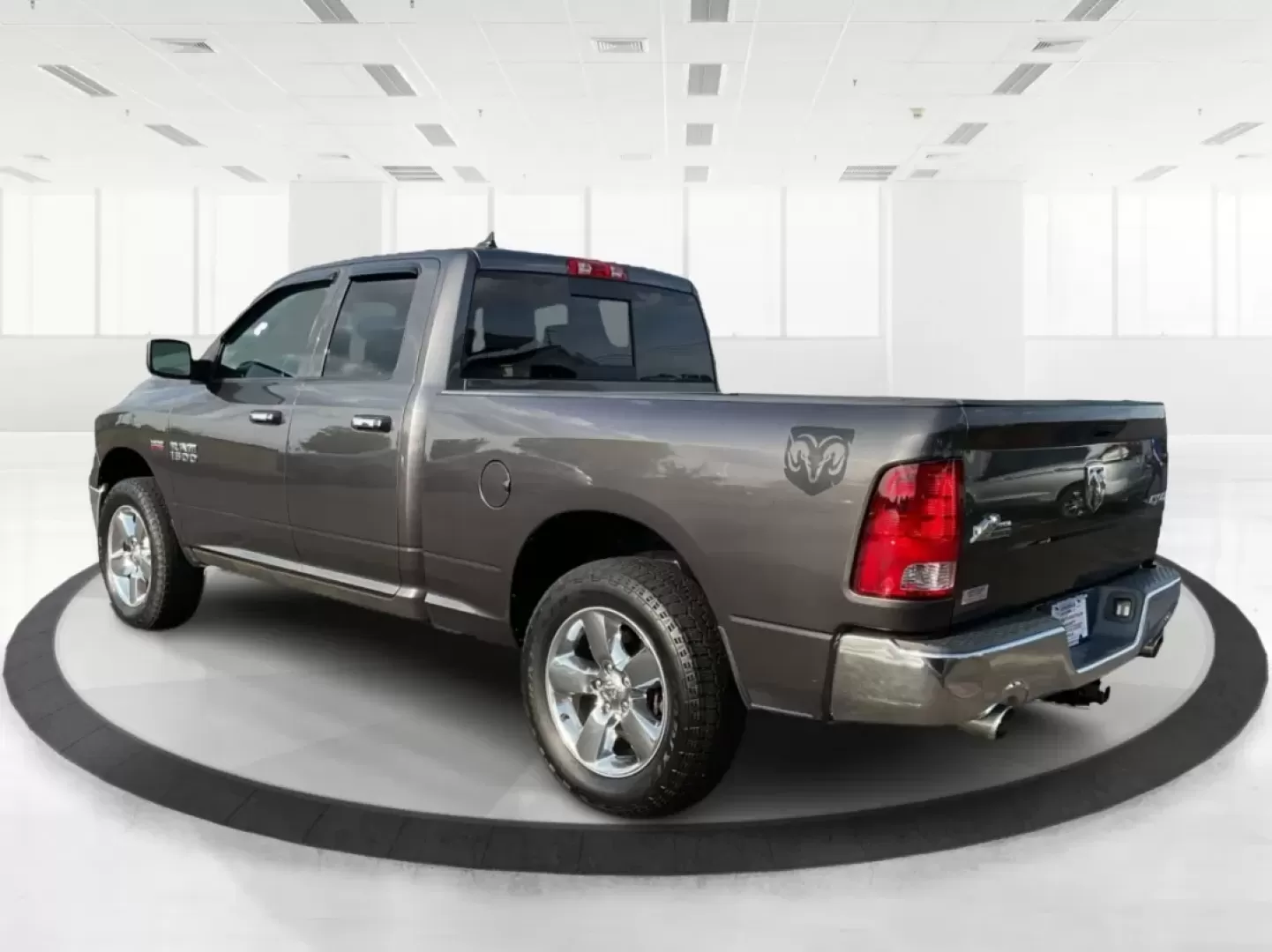 2015 Gray Ram 1500 SLT Quad Cab 4WD (1C6RR7GT3FS) with an 5.7L V8 OHV 16V engine, 8-Speed Automatic transmission, located at 1099 N County Rd 25A , Troy, OH, 45373, (937) 908-9800, 40.057079, -84.212883 - **Experience Adventure and Utility with this 2015 Ram 1500 SLT Quad Cab!**<br /> <br /> Are you ready to elevate your weekend adventures while ensuring your daily commute remains smooth and comfortable? Look no further than this robust 2015 Ram 1500 SLT Quad Cab, now available at Advantage Car and C - Photo#4