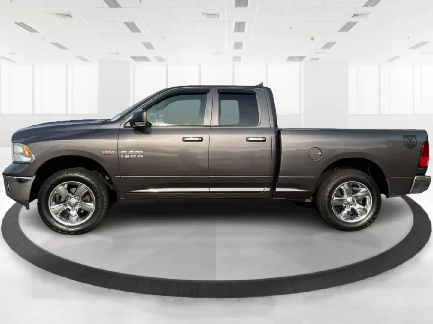 2015 Gray Ram 1500 SLT Quad Cab 4WD (1C6RR7GT3FS) with an 5.7L V8 OHV 16V engine, 8-Speed Automatic transmission, located at 1099 N County Rd 25A , Troy, OH, 45373, (937) 908-9800, 40.057079, -84.212883 - **Experience Adventure and Utility with this 2015 Ram 1500 SLT Quad Cab!**<br /> <br /> Are you ready to elevate your weekend adventures while ensuring your daily commute remains smooth and comfortable? Look no further than this robust 2015 Ram 1500 SLT Quad Cab, now available at Advantage Car and C - Photo#5