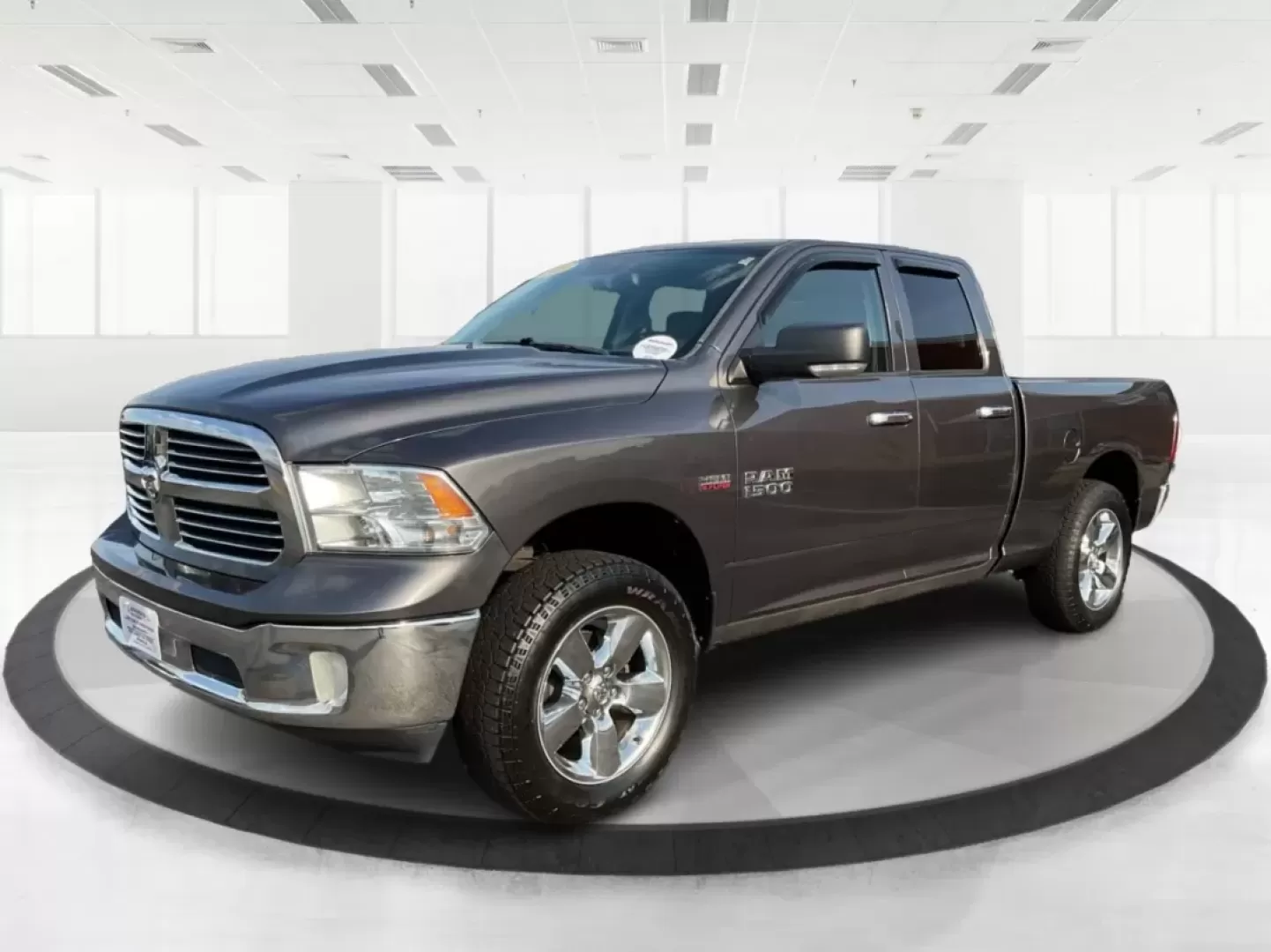 2015 Gray Ram 1500 SLT Quad Cab 4WD (1C6RR7GT3FS) with an 5.7L V8 OHV 16V engine, 8-Speed Automatic transmission, located at 1099 N County Rd 25A , Troy, OH, 45373, (937) 908-9800, 40.057079, -84.212883 - **Experience Adventure and Utility with this 2015 Ram 1500 SLT Quad Cab!**<br /> <br /> Are you ready to elevate your weekend adventures while ensuring your daily commute remains smooth and comfortable? Look no further than this robust 2015 Ram 1500 SLT Quad Cab, now available at Advantage Car and C - Photo#8