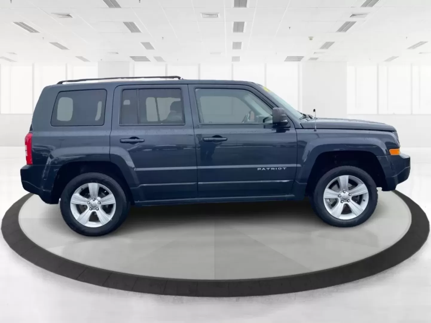 2016 Gray Jeep Patriot Latitude 4WD (1C4NJRFB0GD) with an 2.4L L4 DOHC 16V engine, located at 1951 S Dayton Lakeview Rd., New Carlisle, OH, 45344, (937) 908-9800, 39.890999, -84.050255 - **Unleash the Adventurer in You with the 2016 Jeep Patriot Latitude 4WD!**<br /> <br /> Looking for the perfect vehicle to complement your active lifestyle? Whether you're navigating daily commutes, heading out for weekend getaways, or tackling off-road adventures, the 2016 Jeep Patriot Latitude 4WD - Photo#1