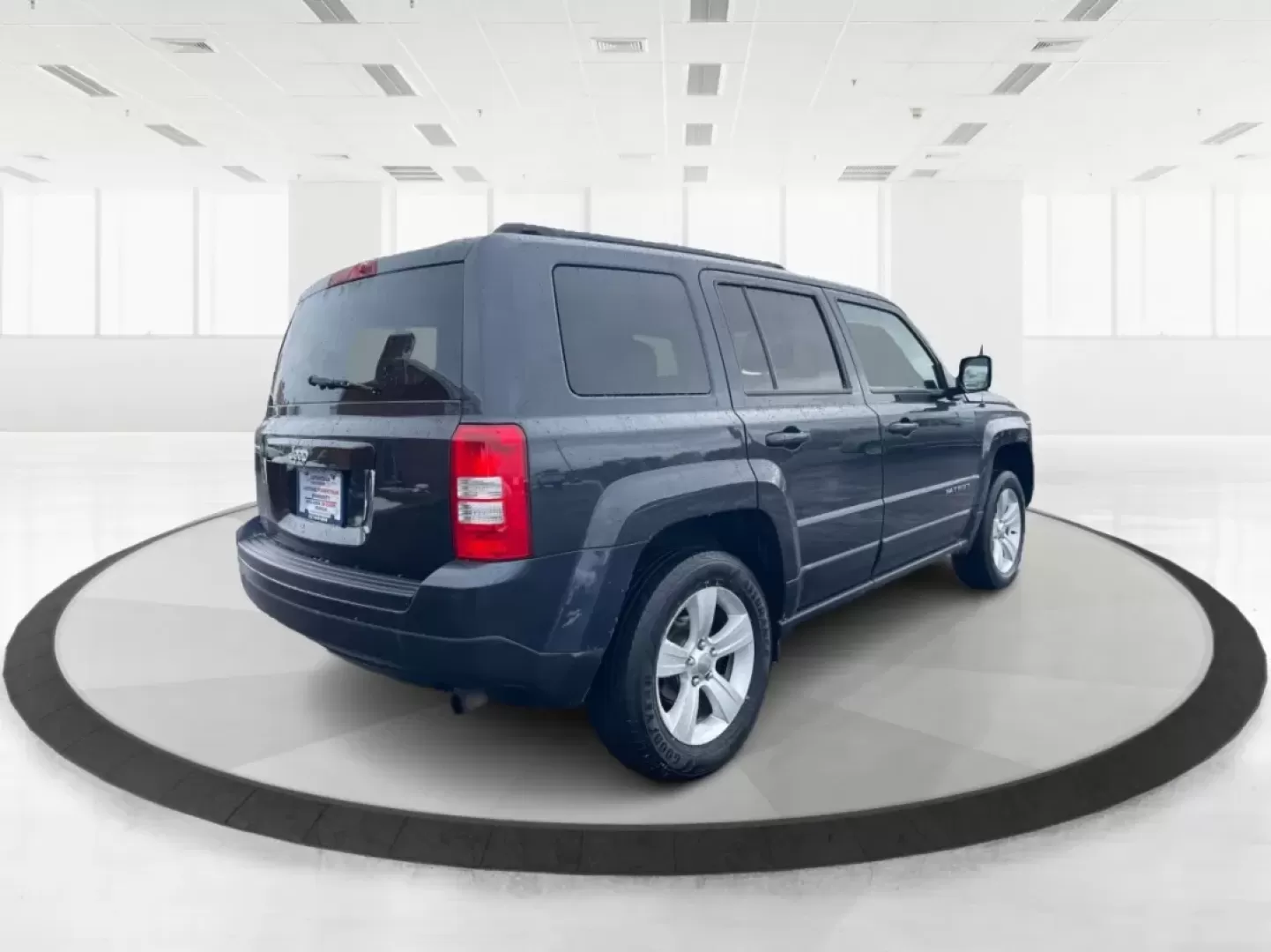 2016 Gray Jeep Patriot Latitude 4WD (1C4NJRFB0GD) with an 2.4L L4 DOHC 16V engine, located at 1951 S Dayton Lakeview Rd., New Carlisle, OH, 45344, (937) 908-9800, 39.890999, -84.050255 - **Unleash the Adventurer in You with the 2016 Jeep Patriot Latitude 4WD!**<br /> <br /> Looking for the perfect vehicle to complement your active lifestyle? Whether you're navigating daily commutes, heading out for weekend getaways, or tackling off-road adventures, the 2016 Jeep Patriot Latitude 4WD - Photo#2