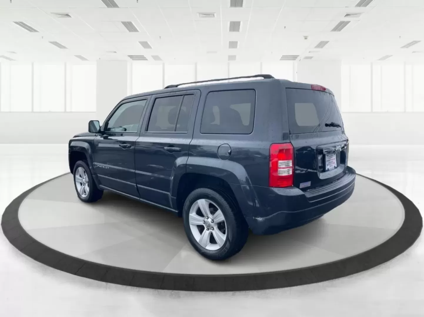 2016 Gray Jeep Patriot Latitude 4WD (1C4NJRFB0GD) with an 2.4L L4 DOHC 16V engine, located at 1951 S Dayton Lakeview Rd., New Carlisle, OH, 45344, (937) 908-9800, 39.890999, -84.050255 - **Unleash the Adventurer in You with the 2016 Jeep Patriot Latitude 4WD!**<br /> <br /> Looking for the perfect vehicle to complement your active lifestyle? Whether you're navigating daily commutes, heading out for weekend getaways, or tackling off-road adventures, the 2016 Jeep Patriot Latitude 4WD - Photo#4