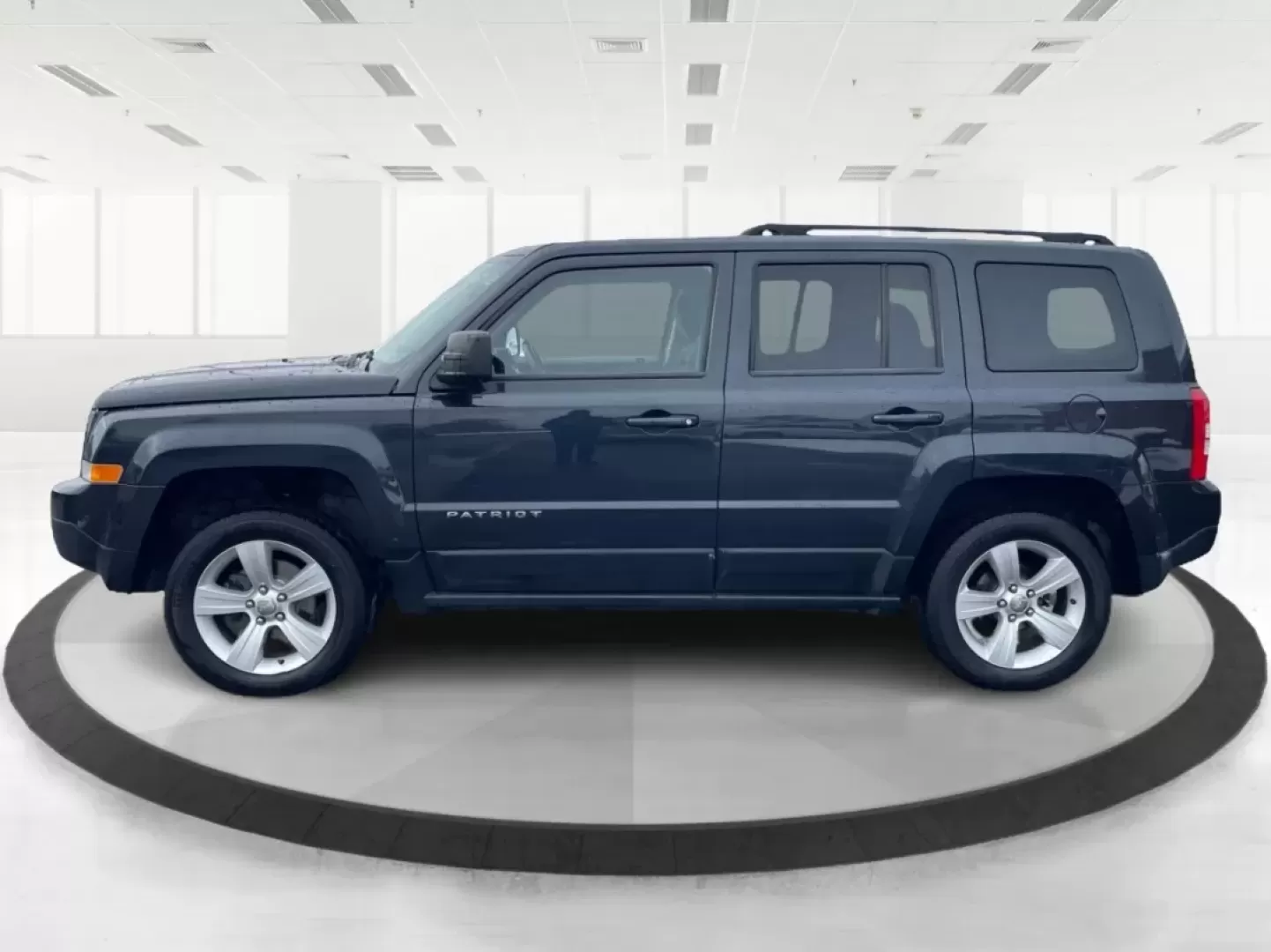 2016 Gray Jeep Patriot Latitude 4WD (1C4NJRFB0GD) with an 2.4L L4 DOHC 16V engine, located at 1951 S Dayton Lakeview Rd., New Carlisle, OH, 45344, (937) 908-9800, 39.890999, -84.050255 - **Unleash the Adventurer in You with the 2016 Jeep Patriot Latitude 4WD!**<br /> <br /> Looking for the perfect vehicle to complement your active lifestyle? Whether you're navigating daily commutes, heading out for weekend getaways, or tackling off-road adventures, the 2016 Jeep Patriot Latitude 4WD - Photo#5