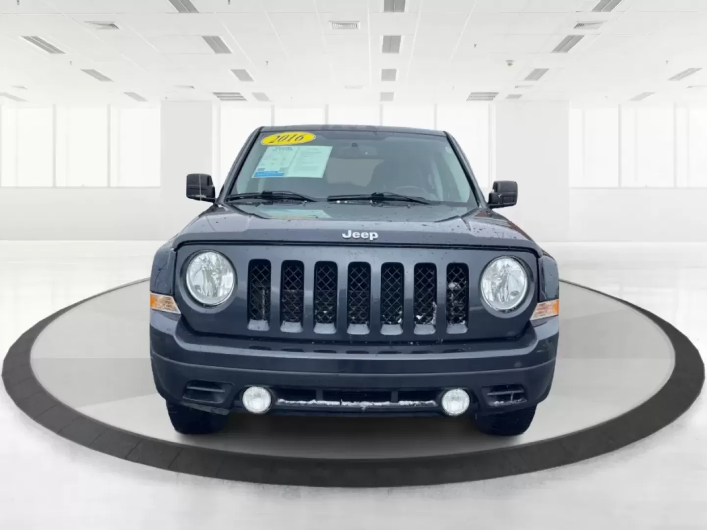 2016 Gray Jeep Patriot Latitude 4WD (1C4NJRFB0GD) with an 2.4L L4 DOHC 16V engine, located at 1951 S Dayton Lakeview Rd., New Carlisle, OH, 45344, (937) 908-9800, 39.890999, -84.050255 - **Unleash the Adventurer in You with the 2016 Jeep Patriot Latitude 4WD!**<br /> <br /> Looking for the perfect vehicle to complement your active lifestyle? Whether you're navigating daily commutes, heading out for weekend getaways, or tackling off-road adventures, the 2016 Jeep Patriot Latitude 4WD - Photo#7