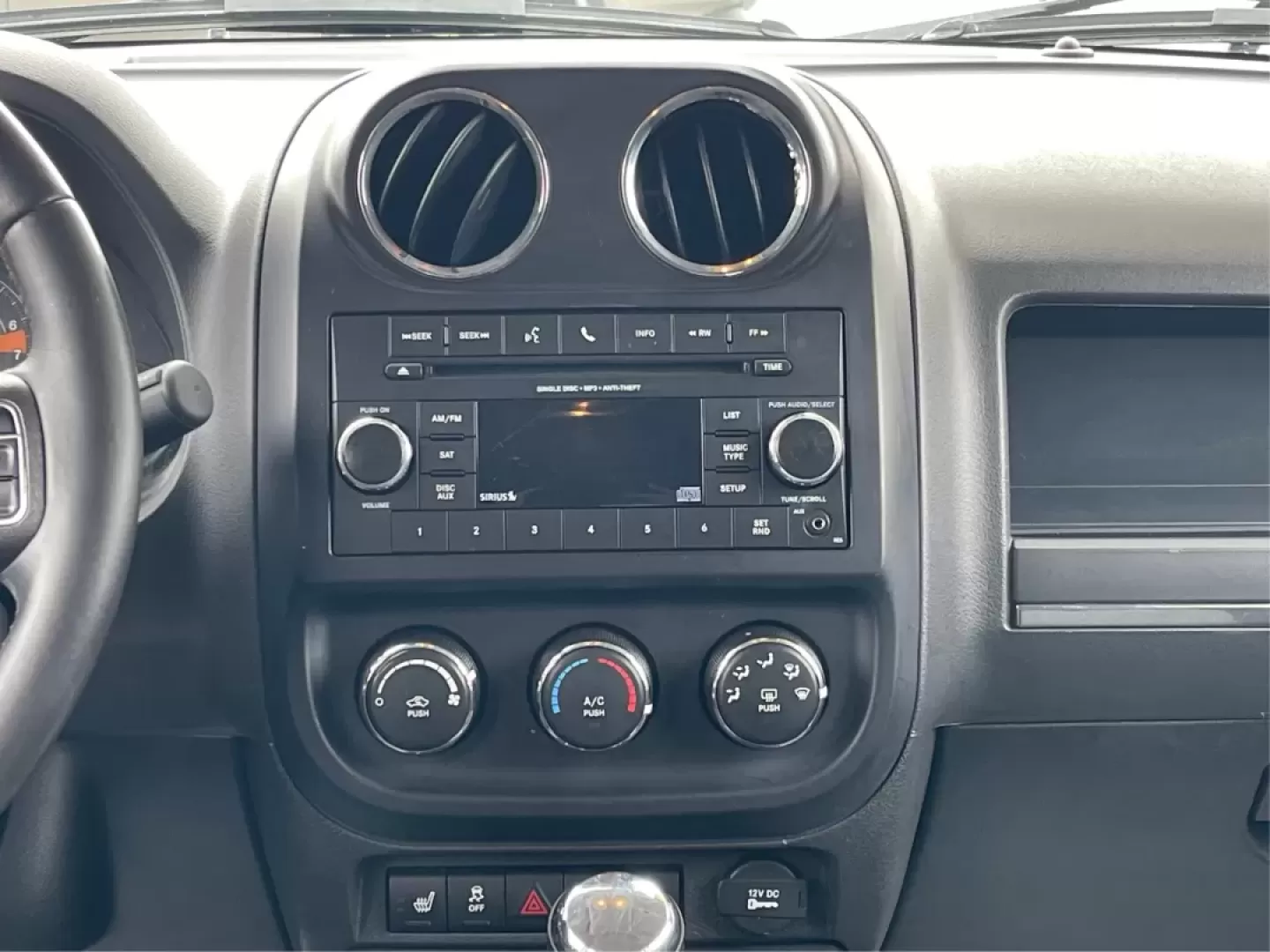 2016 Gray Jeep Patriot Latitude 4WD (1C4NJRFB0GD) with an 2.4L L4 DOHC 16V engine, located at 1951 S Dayton Lakeview Rd., New Carlisle, OH, 45344, (937) 908-9800, 39.890999, -84.050255 - **Unleash the Adventurer in You with the 2016 Jeep Patriot Latitude 4WD!**<br /> <br /> Looking for the perfect vehicle to complement your active lifestyle? Whether you're navigating daily commutes, heading out for weekend getaways, or tackling off-road adventures, the 2016 Jeep Patriot Latitude 4WD - Photo#12