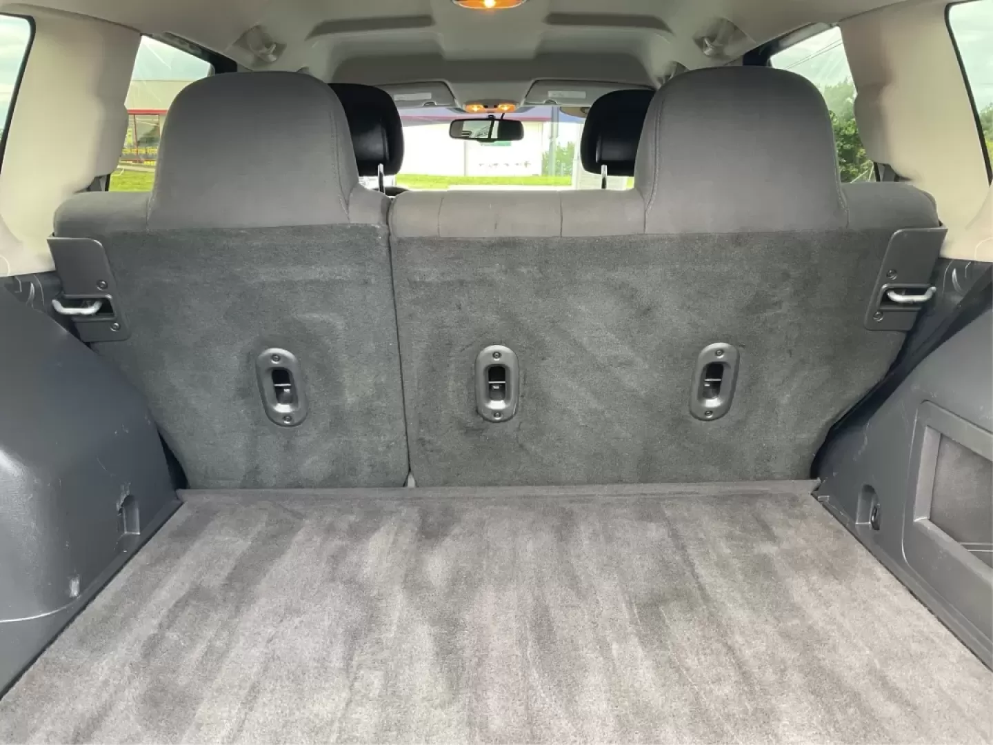 2015 Jeep Compass Sport (1C4NJDBB6FD) with an 2.4L I-4 DOHC engine, located at 880 E. National Road, Vandalia, OH, 45377, (937) 908-9800, 39.891918, -84.183594 - **Explore Adventure and Comfort with the 2015 Jeep Compass Sport at Advantage Car and Credit!**<br /> <br /> Whether you're navigating your daily commute or embarking on a weekend getaway, the 2015 Jeep Compass Sport is designed with versatility in mind. With a spacious interior and rugged capabilit - Photo#12