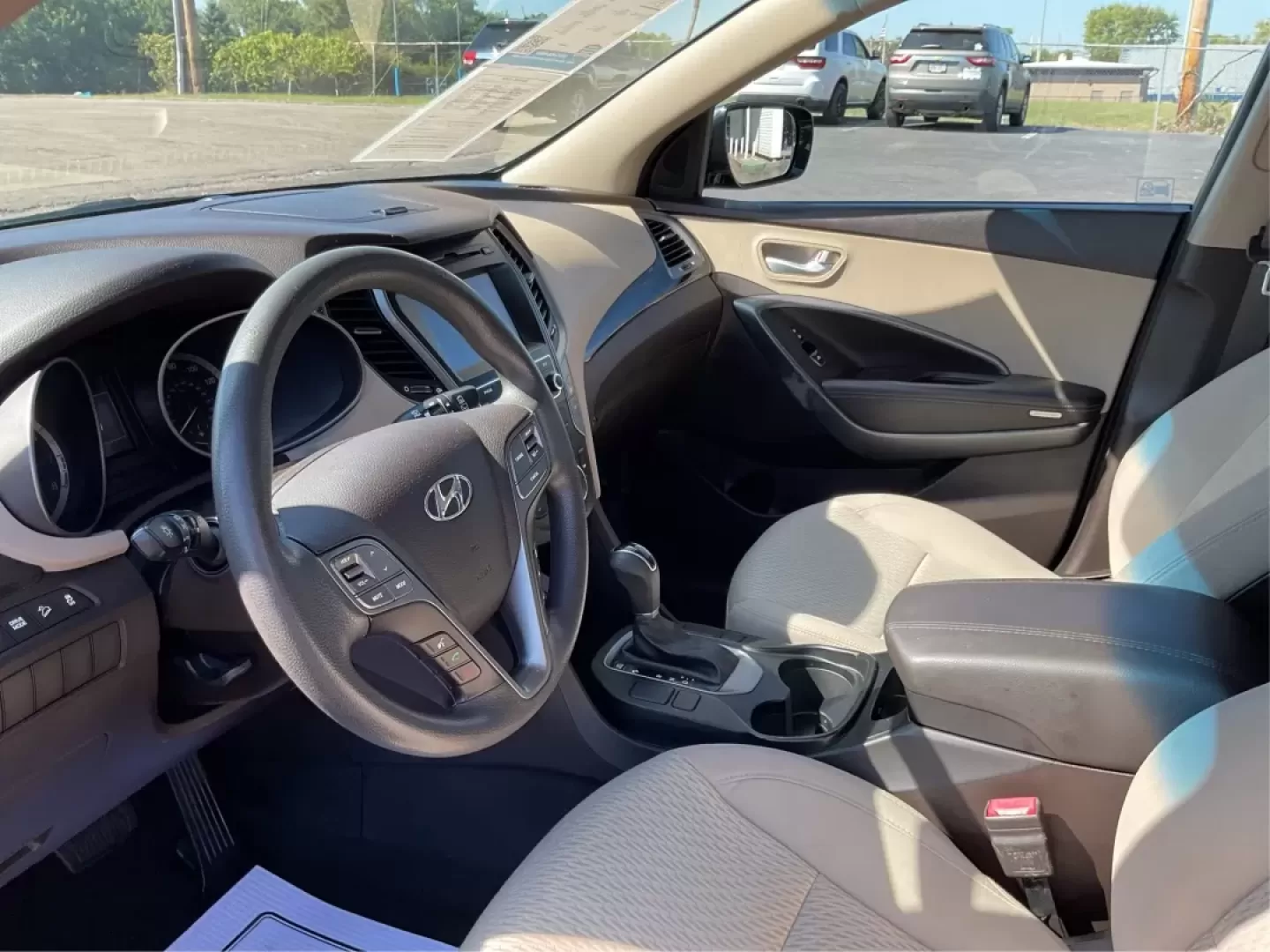 2017 Marlin Blue Hyundai Santa Fe Sport 2.4 FWD (5NMZU3LB6HH) with an 2.4L L4 DOHC 16V engine, 6-Speed Automatic transmission, located at 4508 South Dixie Dr, Moraine, OH, 45439, (937) 908-9800, 39.689976, -84.218452 - **Explore Adventure with the 2017 Hyundai Santa Fe - Perfect for Families and Weekend Warriors!**<br /> <br /> Are you in search of a versatile SUV that can handle everything from family road trips to daily commutes? Look no further! The 2017 Hyundai Santa Fe, featuring a stunning Marlin Blue exteri - Photo#9