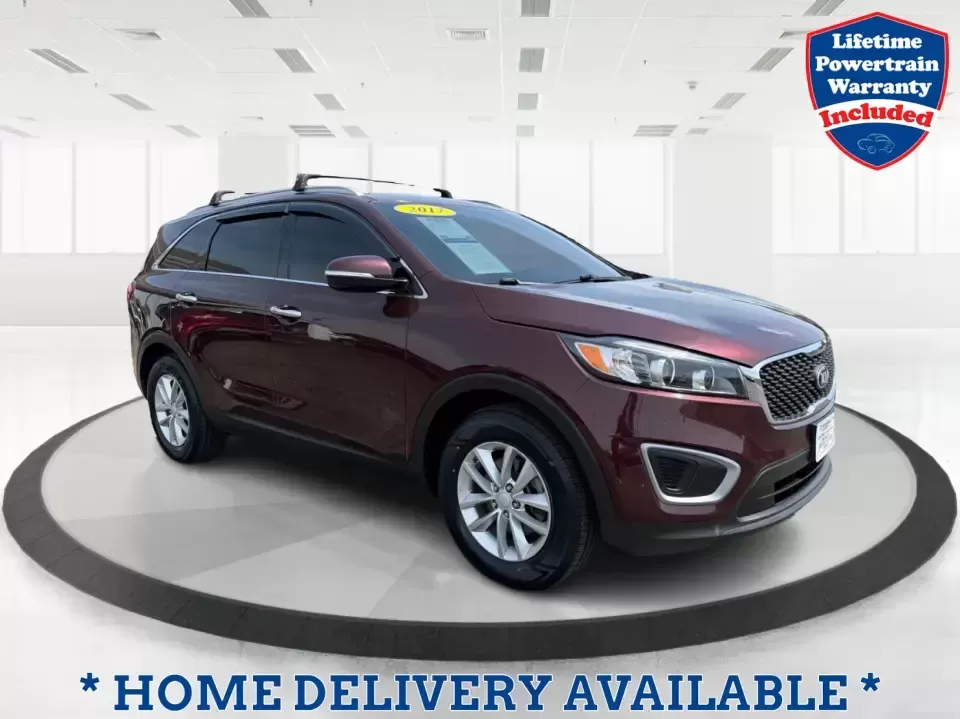 2017 Burgundy Kia Sorento L 2WD (5XYPG4A31HG) with an 2.4L L4 DOHC 16V engine, 6-Speed Automatic transmission, located at 4508 South Dixie Dr, Moraine, OH, 45439, (937) 908-9800, 39.689976, -84.218452 - Pack up the kids, load the groceries, and still have room for a spontaneous weekend escape to Carillon Historical Park or a day exploring Cox Arboretum-this 2017 Kia Sorento L 2WD is the kind of practical SUV that fits real Moraine and Dayton-area life. With three-row versatility in a midsize footpr - Photo#0