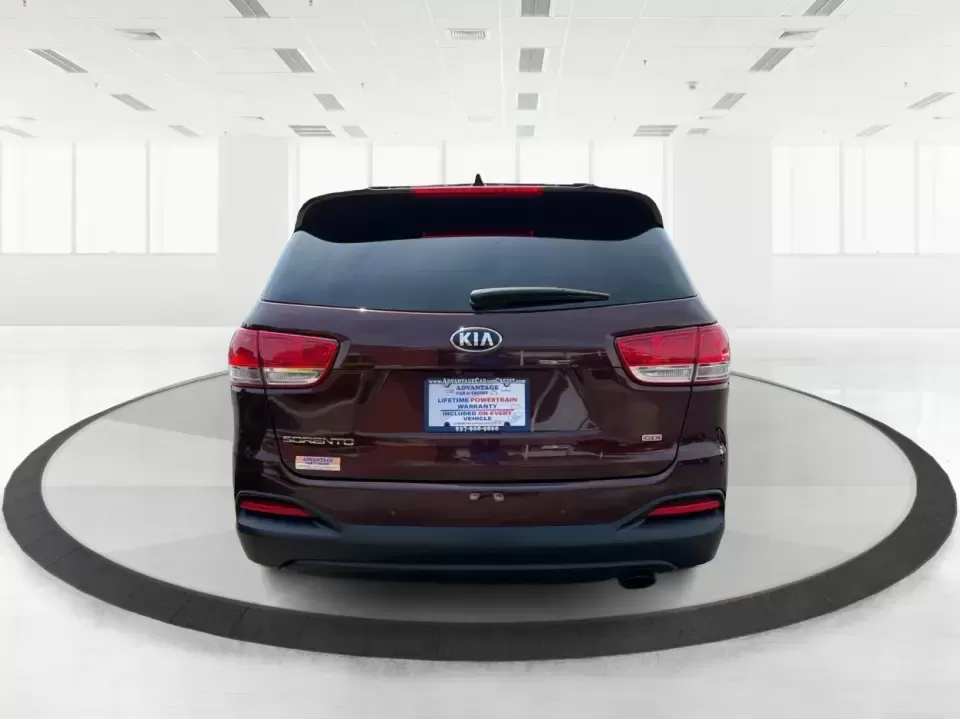 2017 Burgundy Kia Sorento L 2WD (5XYPG4A31HG) with an 2.4L L4 DOHC 16V engine, 6-Speed Automatic transmission, located at 4508 South Dixie Dr, Moraine, OH, 45439, (937) 908-9800, 39.689976, -84.218452 - Pack up the kids, load the groceries, and still have room for a spontaneous weekend escape to Carillon Historical Park or a day exploring Cox Arboretum-this 2017 Kia Sorento L 2WD is the kind of practical SUV that fits real Moraine and Dayton-area life. With three-row versatility in a midsize footpr - Photo#3