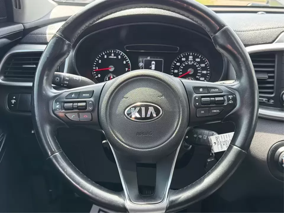 2017 Burgundy Kia Sorento L 2WD (5XYPG4A31HG) with an 2.4L L4 DOHC 16V engine, 6-Speed Automatic transmission, located at 4508 South Dixie Dr, Moraine, OH, 45439, (937) 908-9800, 39.689976, -84.218452 - Pack up the kids, load the groceries, and still have room for a spontaneous weekend escape to Carillon Historical Park or a day exploring Cox Arboretum-this 2017 Kia Sorento L 2WD is the kind of practical SUV that fits real Moraine and Dayton-area life. With three-row versatility in a midsize footpr - Photo#16