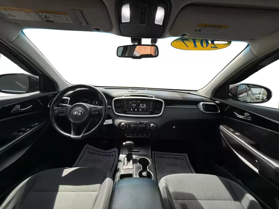 2017 Burgundy Kia Sorento L 2WD (5XYPG4A31HG) with an 2.4L L4 DOHC 16V engine, 6-Speed Automatic transmission, located at 4508 South Dixie Dr, Moraine, OH, 45439, (937) 908-9800, 39.689976, -84.218452 - Pack up the kids, load the groceries, and still have room for a spontaneous weekend escape to Carillon Historical Park or a day exploring Cox Arboretum-this 2017 Kia Sorento L 2WD is the kind of practical SUV that fits real Moraine and Dayton-area life. With three-row versatility in a midsize footpr - Photo#20