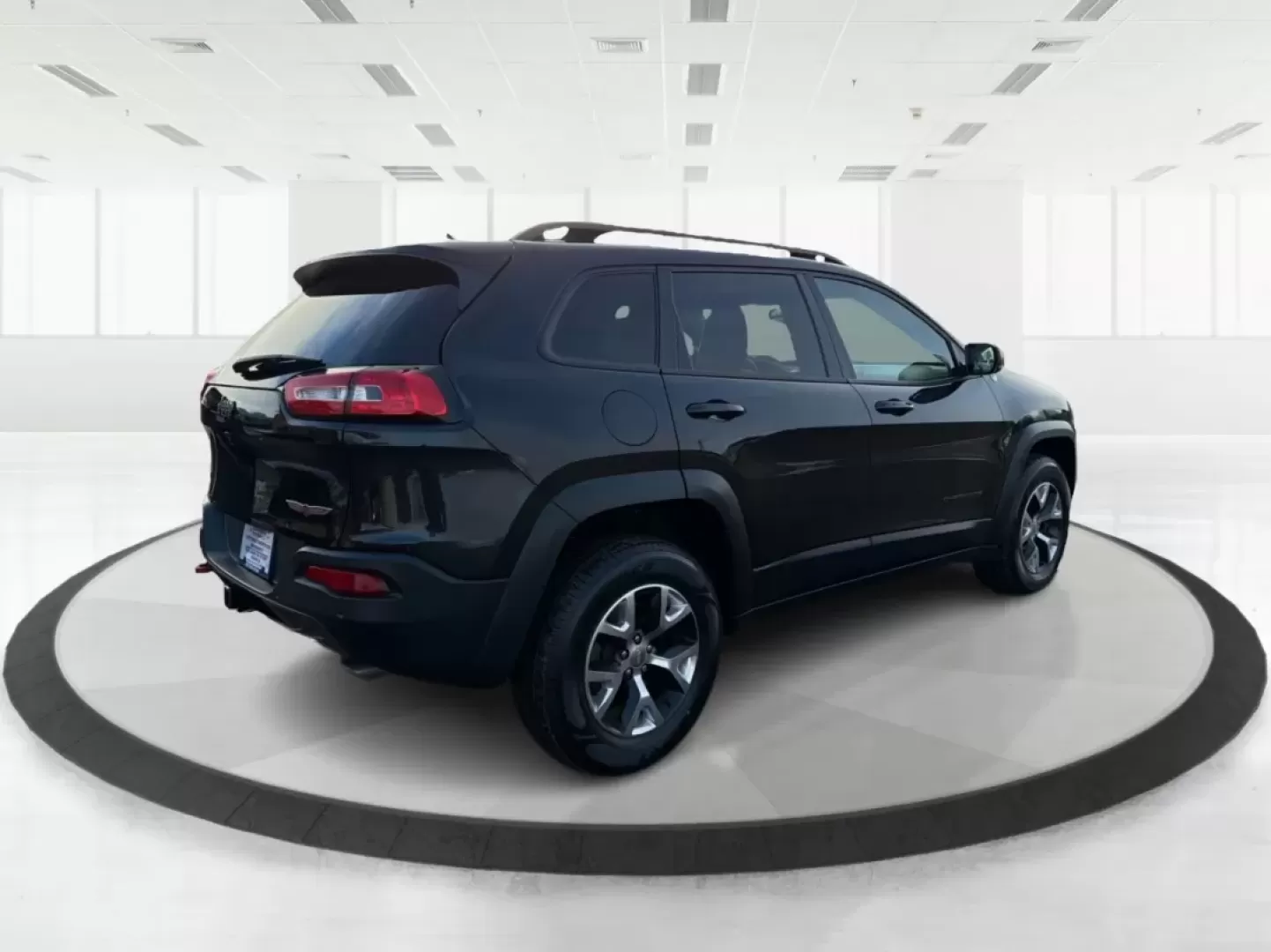 2014 Brilliant Black Crystal P Jeep Cherokee Trailhawk 4WD (1C4PJMBS4EW) with an 3.2L V6 DOHC 24V engine, 9-Speed Automatic transmission, located at 4508 South Dixie Dr, Moraine, OH, 45439, (937) 908-9800, 39.689976, -84.218452 - **Explore New Horizons with the 2014 Jeep Cherokee Trailhawk Your Adventure Awaits!**<br /> <br /> Looking for a vehicle that can keep up with your adventurous spirit while still being suitable for everyday life? Look no further than the 2014 Jeep Cherokee Trailhawk! This capable crossover SUV is p - Photo#2