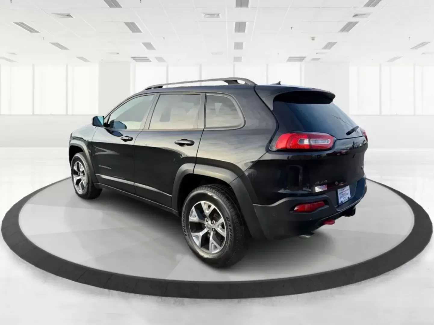 2014 Brilliant Black Crystal P Jeep Cherokee Trailhawk 4WD (1C4PJMBS4EW) with an 3.2L V6 DOHC 24V engine, 9-Speed Automatic transmission, located at 4508 South Dixie Dr, Moraine, OH, 45439, (937) 908-9800, 39.689976, -84.218452 - **Explore New Horizons with the 2014 Jeep Cherokee Trailhawk Your Adventure Awaits!**<br /> <br /> Looking for a vehicle that can keep up with your adventurous spirit while still being suitable for everyday life? Look no further than the 2014 Jeep Cherokee Trailhawk! This capable crossover SUV is p - Photo#4