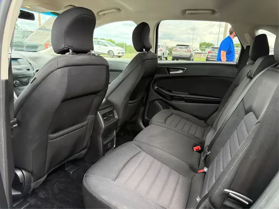 2015 Ford Edge SE FWD (2FMTK3G98FB) with an 2.0L L4 DOHC 16V engine, 6-Speed Automatic transmission, located at 8750 N County Rd 25A, Piqua, OH, 45356, (937) 908-9800, 40.164391, -84.232513 - Need an SUV that fits real life in the Miami Valley-school drop-offs, a steady commute down I75, and weekend errands that somehow turn into a full cargo load? This 2015 Ford Edge SE FWD is built for everyday versatility, with comfortable seating for five, a roomy cabin, and practical tech that helps- Photo#10