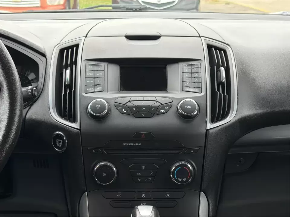 2015 Ford Edge SE FWD (2FMTK3G98FB) with an 2.0L L4 DOHC 16V engine, 6-Speed Automatic transmission, located at 8750 N County Rd 25A, Piqua, OH, 45356, (937) 908-9800, 40.164391, -84.232513 - Need an SUV that fits real life in the Miami Valley-school drop-offs, a steady commute down I75, and weekend errands that somehow turn into a full cargo load? This 2015 Ford Edge SE FWD is built for everyday versatility, with comfortable seating for five, a roomy cabin, and practical tech that helps- Photo#13