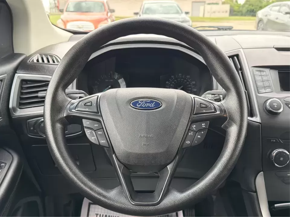 2015 Ford Edge SE FWD (2FMTK3G98FB) with an 2.0L L4 DOHC 16V engine, 6-Speed Automatic transmission, located at 8750 N County Rd 25A, Piqua, OH, 45356, (937) 908-9800, 40.164391, -84.232513 - Need an SUV that fits real life in the Miami Valley-school drop-offs, a steady commute down I75, and weekend errands that somehow turn into a full cargo load? This 2015 Ford Edge SE FWD is built for everyday versatility, with comfortable seating for five, a roomy cabin, and practical tech that helps- Photo#16