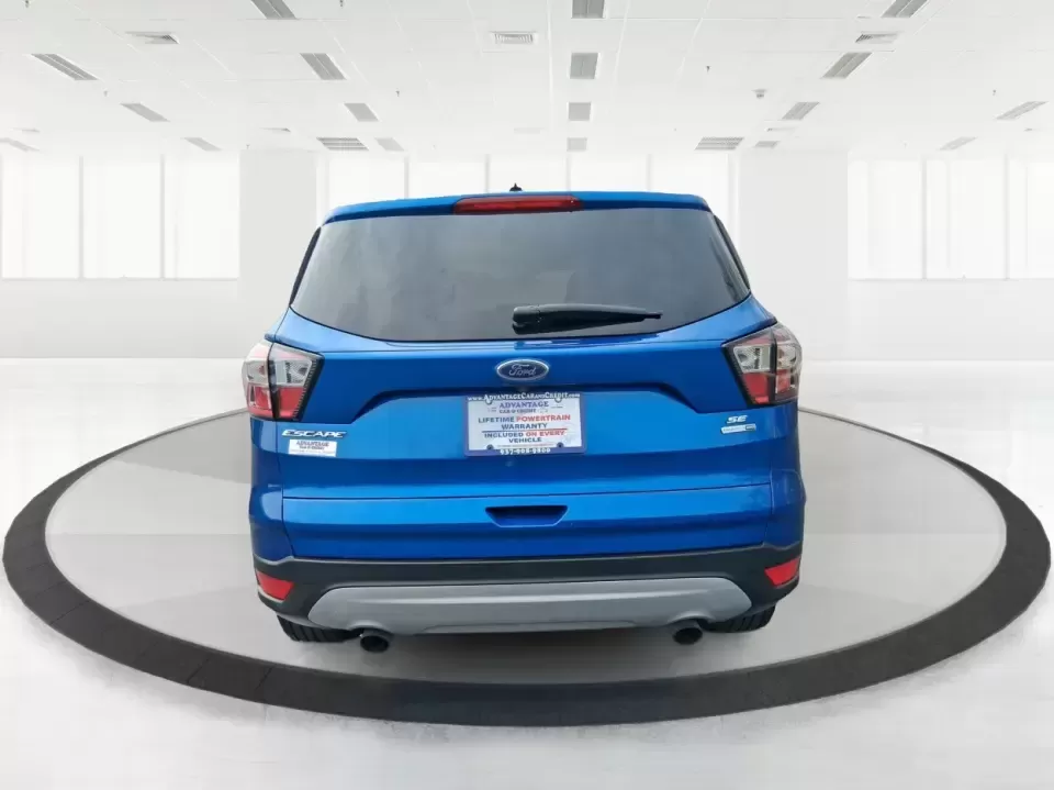 2017 Ford Escape SE 4WD (1FMCU9G93HU) with an 2.0L L4 DOHC 16V engine, 6-Speed Automatic transmission, located at 1099 N County Rd 25A , Troy, OH, 45373, (937) 908-9800, 40.057079, -84.212883 - Discover the ultimate blend of comfort, capability, and style with the 2017 Ford Escape SE 4WD, a perfect companion for families on the go or adventurers seeking their next weekend thrill. With its spacious interior and robust features, this SUV is designed for those who lead an active lifestyle, ma - Photo#3