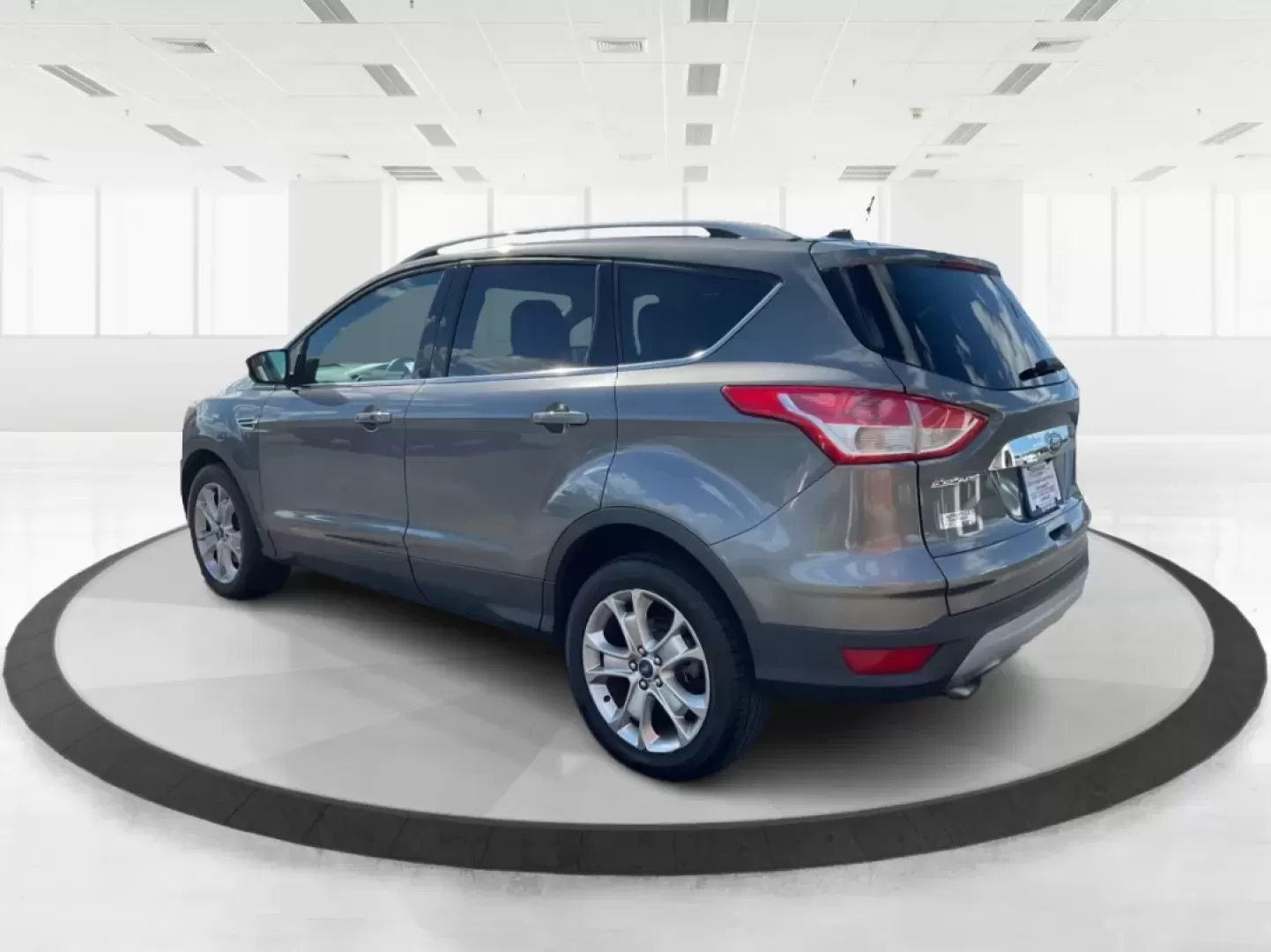 2014 Ford Escape Titanium 4WD (1FMCU9J92EU) with an 2.0L L4 DOHC 16V engine, 6-Speed Automatic transmission, located at 1184 Kauffman Ave, Fairborn, OH, 45324, (937) 908-9800, 39.807072, -84.030914 - Looking for a versatile vehicle that accommodates your dynamic lifestyle? Meet the 2014 Ford Escape Titanium, the perfect SUV for growing families, adventurous souls, and budget-conscious buyers alike! With its impressive blend of performance, comfort, and cutting-edge technology, this Ford Escape i - Photo#4