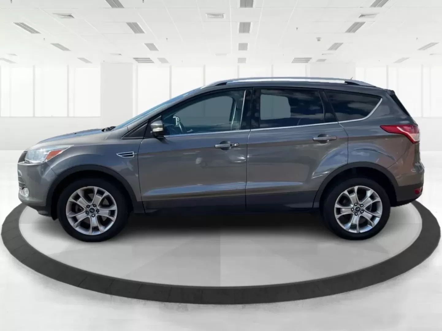 2014 Ford Escape Titanium 4WD (1FMCU9J92EU) with an 2.0L L4 DOHC 16V engine, 6-Speed Automatic transmission, located at 1184 Kauffman Ave, Fairborn, OH, 45324, (937) 908-9800, 39.807072, -84.030914 - Looking for a versatile vehicle that accommodates your dynamic lifestyle? Meet the 2014 Ford Escape Titanium, the perfect SUV for growing families, adventurous souls, and budget-conscious buyers alike! With its impressive blend of performance, comfort, and cutting-edge technology, this Ford Escape i - Photo#5