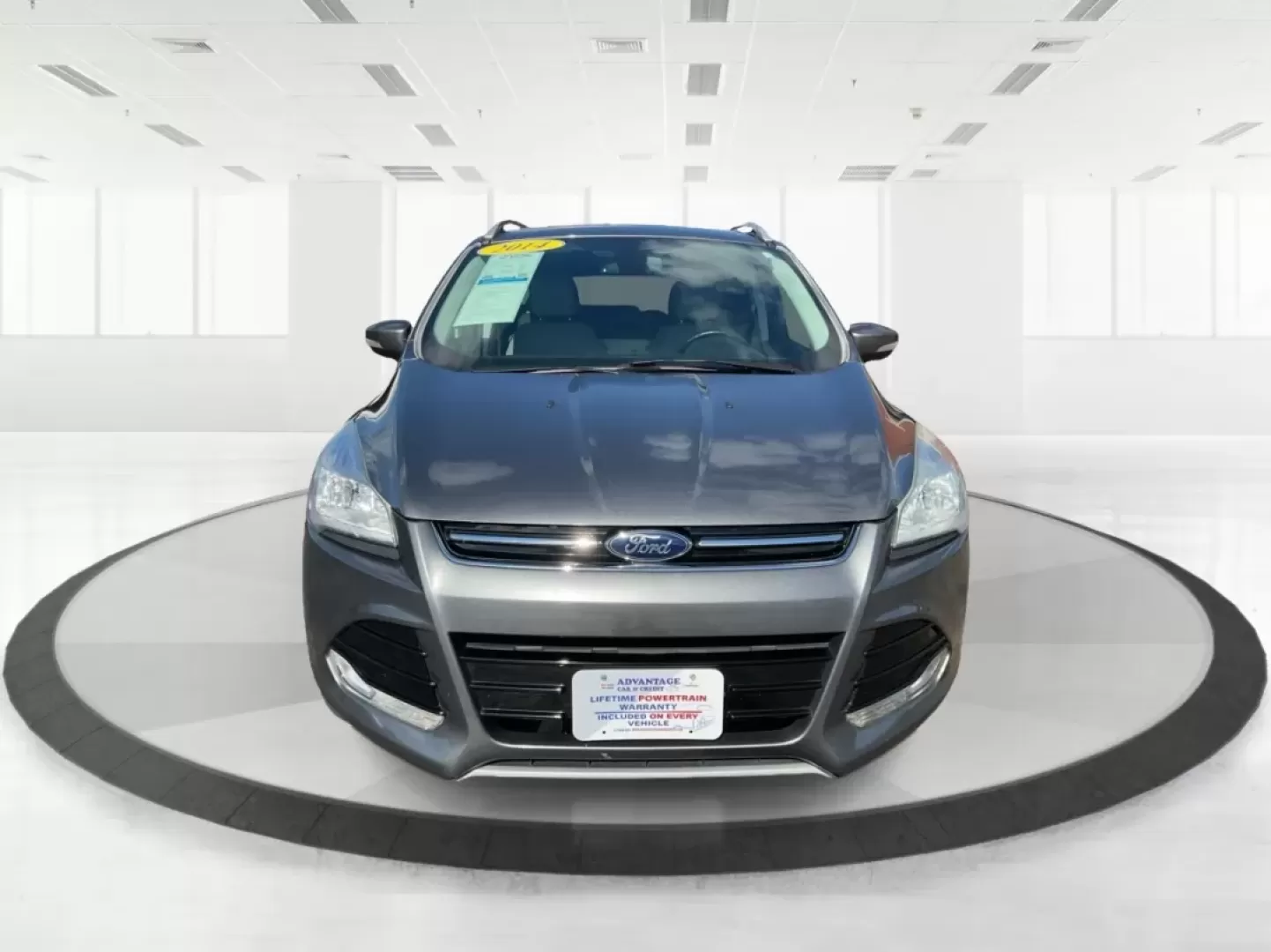 2014 Ford Escape Titanium 4WD (1FMCU9J92EU) with an 2.0L L4 DOHC 16V engine, 6-Speed Automatic transmission, located at 1184 Kauffman Ave, Fairborn, OH, 45324, (937) 908-9800, 39.807072, -84.030914 - Looking for a versatile vehicle that accommodates your dynamic lifestyle? Meet the 2014 Ford Escape Titanium, the perfect SUV for growing families, adventurous souls, and budget-conscious buyers alike! With its impressive blend of performance, comfort, and cutting-edge technology, this Ford Escape i - Photo#7