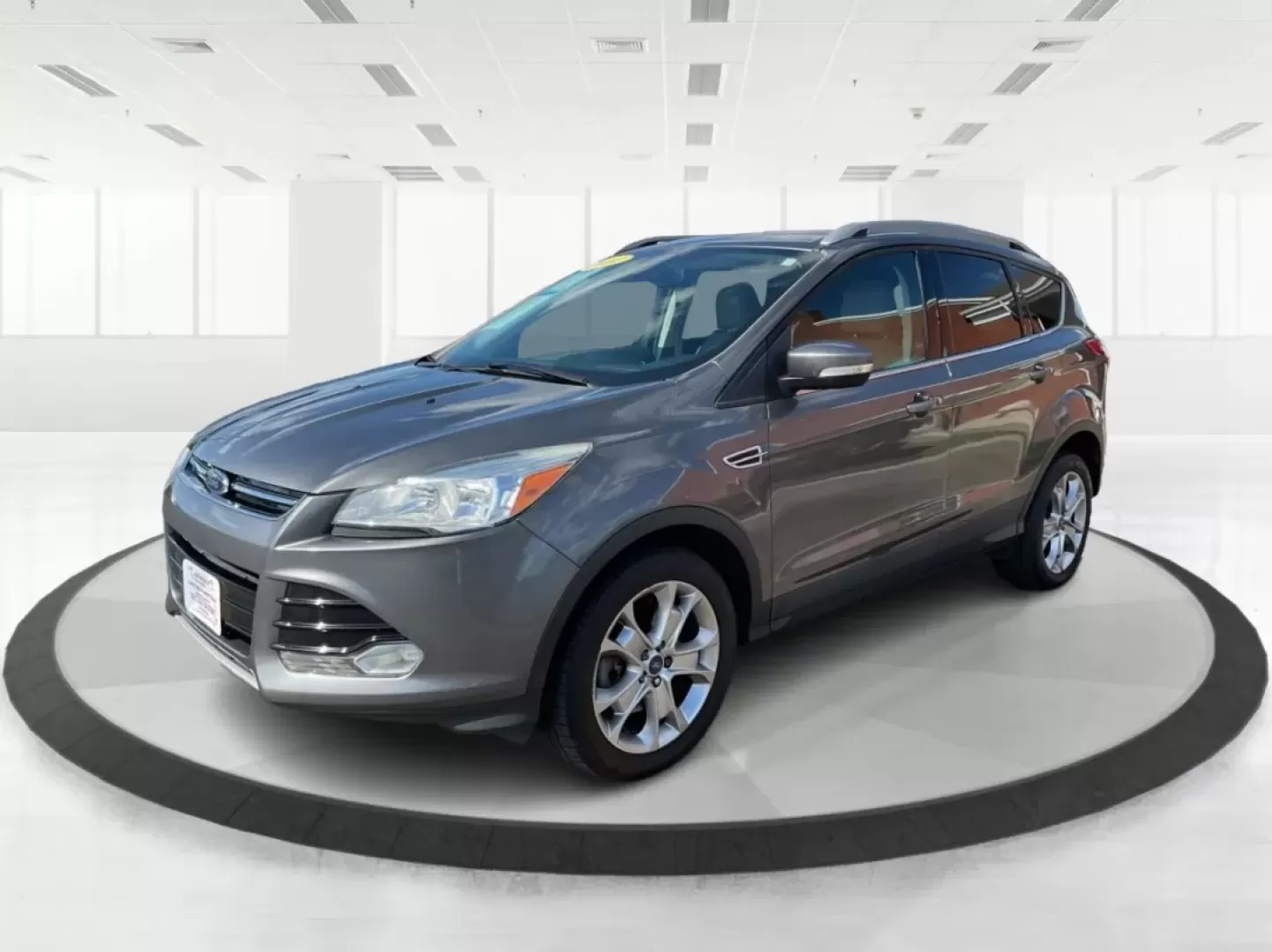 2014 Ford Escape Titanium 4WD (1FMCU9J92EU) with an 2.0L L4 DOHC 16V engine, 6-Speed Automatic transmission, located at 1184 Kauffman Ave, Fairborn, OH, 45324, (937) 908-9800, 39.807072, -84.030914 - Looking for a versatile vehicle that accommodates your dynamic lifestyle? Meet the 2014 Ford Escape Titanium, the perfect SUV for growing families, adventurous souls, and budget-conscious buyers alike! With its impressive blend of performance, comfort, and cutting-edge technology, this Ford Escape i - Photo#8