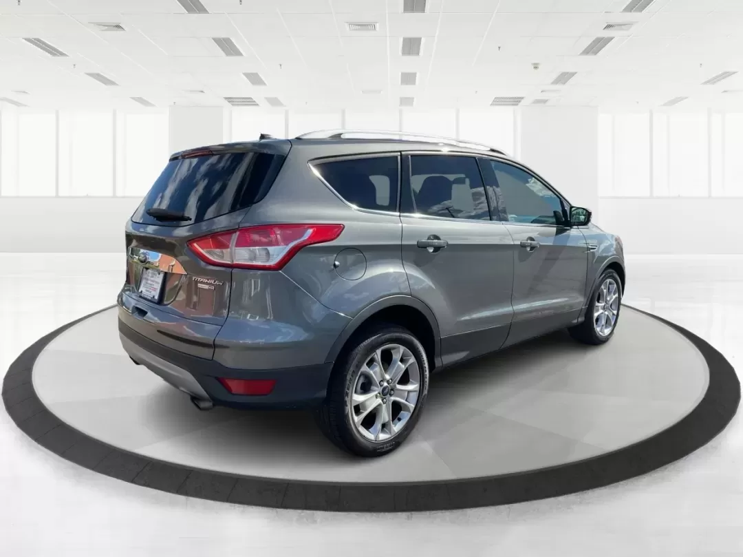 2014 Ford Escape Titanium 4WD (1FMCU9J92EU) with an 2.0L L4 DOHC 16V engine, 6-Speed Automatic transmission, located at 401 Woodman Dr, Riverside, OH, 45431, (937) 908-9800, 39.760899, -84.123421 - Looking for a versatile vehicle that accommodates your dynamic lifestyle? Meet the 2014 Ford Escape Titanium, the perfect SUV for growing families, adventurous souls, and budget-conscious buyers alike! With its impressive blend of performance, comfort, and cutting-edge technology, this Ford Escape i - Photo#2