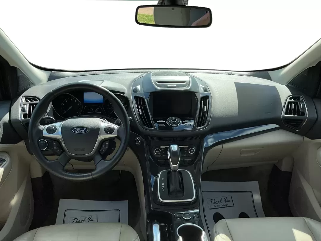 2014 Ford Escape Titanium 4WD (1FMCU9J92EU) with an 2.0L L4 DOHC 16V engine, 6-Speed Automatic transmission, located at 401 Woodman Dr, Riverside, OH, 45431, (937) 908-9800, 39.760899, -84.123421 - Looking for a versatile vehicle that accommodates your dynamic lifestyle? Meet the 2014 Ford Escape Titanium, the perfect SUV for growing families, adventurous souls, and budget-conscious buyers alike! With its impressive blend of performance, comfort, and cutting-edge technology, this Ford Escape i - Photo#21