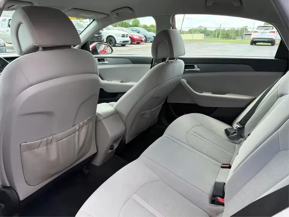 2017 Hyundai Sonata SE (5NPE24AF8HH) with an 2.4L L4 DOHC 16V engine, 7-Speed Automatic transmission, located at 8750 N County Rd 25A, Piqua, OH, 45356, (937) 908-9800, 40.164391, -84.232513 - Ready for a dependable commuter that still looks sharp pulling into work, school pickup, or a weekend dinner in town? This Scarlet Red 2017 Hyundai Sonata SE is a practical, comfortable sedan that fits real-life schedules in Piqua, Ohio-whether you're cruising up N County Rd 25A, heading toward I75 - Photo#10