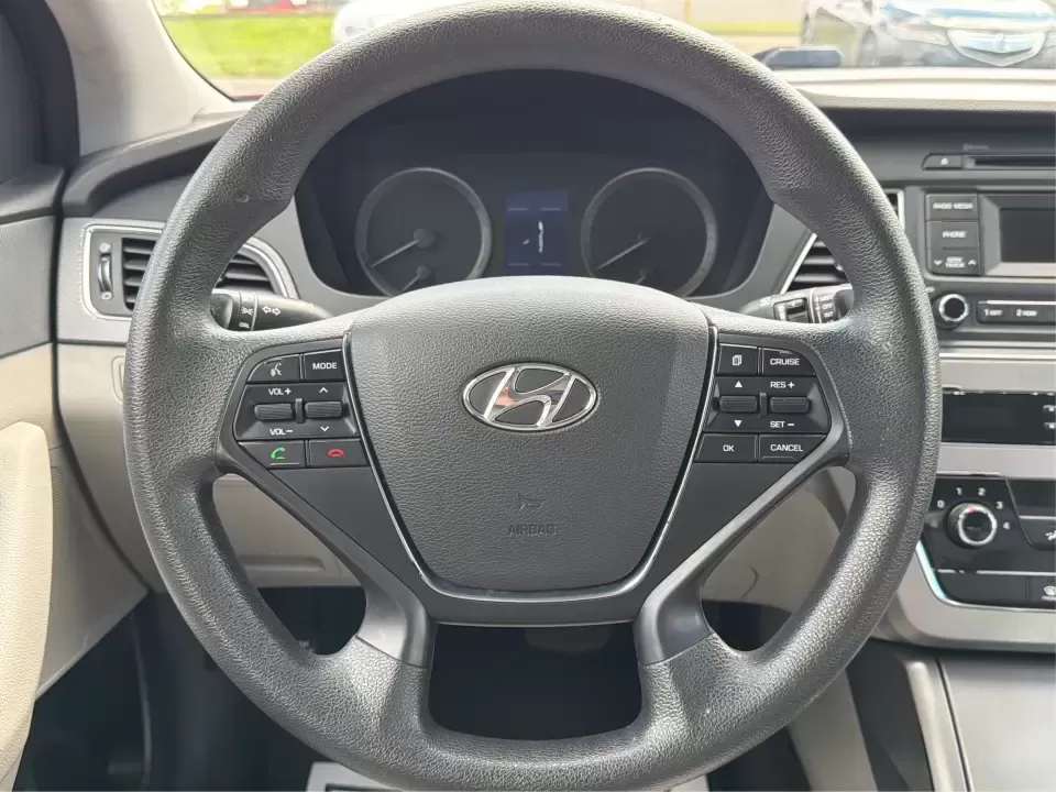 2017 Hyundai Sonata SE (5NPE24AF8HH) with an 2.4L L4 DOHC 16V engine, 7-Speed Automatic transmission, located at 8750 N County Rd 25A, Piqua, OH, 45356, (937) 908-9800, 40.164391, -84.232513 - Ready for a dependable commuter that still looks sharp pulling into work, school pickup, or a weekend dinner in town? This Scarlet Red 2017 Hyundai Sonata SE is a practical, comfortable sedan that fits real-life schedules in Piqua, Ohio-whether you're cruising up N County Rd 25A, heading toward I75 - Photo#16