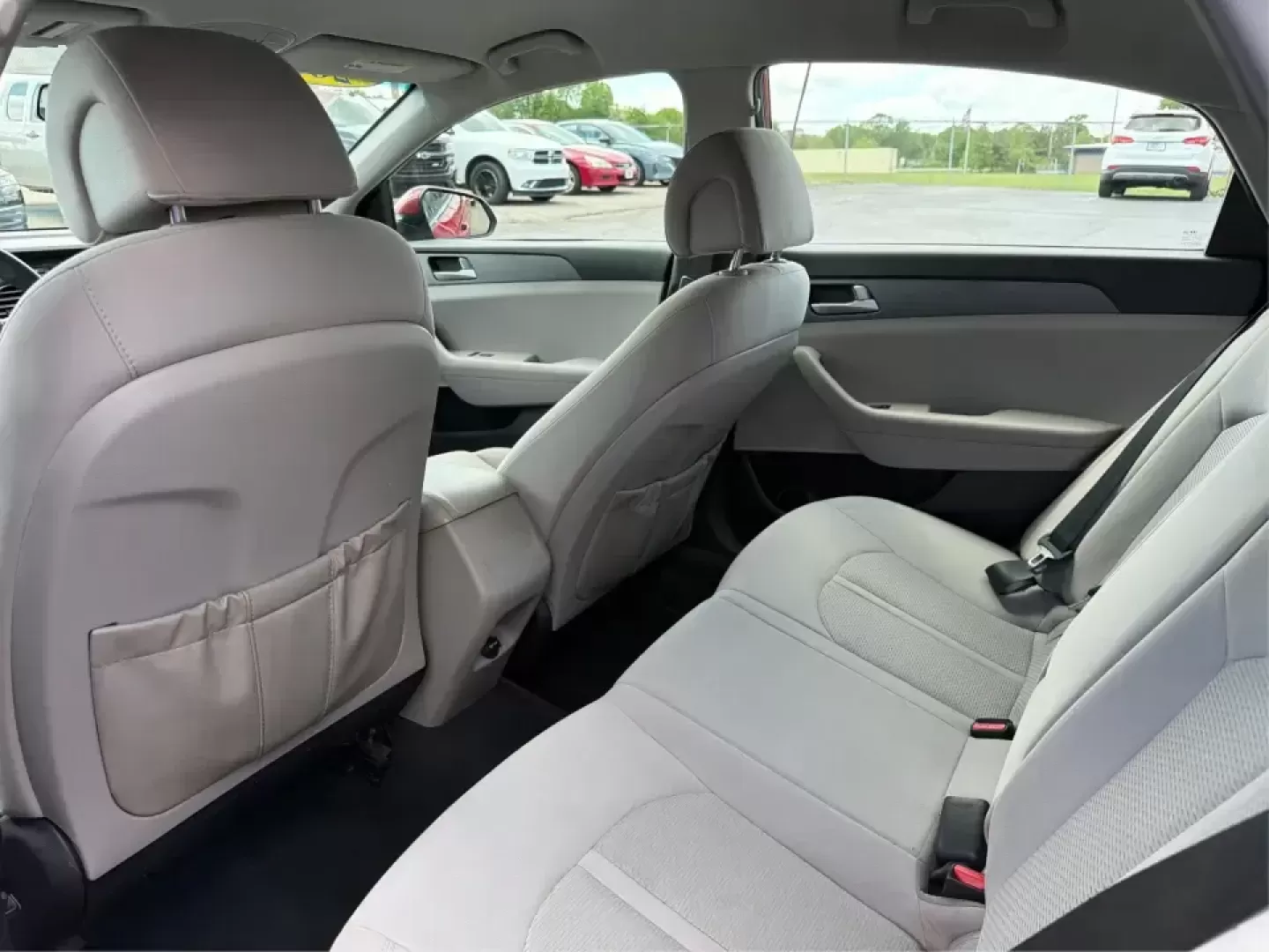 2017 Hyundai Sonata SE (5NPE24AF8HH) with an 2.4L L4 DOHC 16V engine, 7-Speed Automatic transmission, located at 1951 S Dayton Lakeview Rd., New Carlisle, OH, 45344, (937) 908-9800, 39.890999, -84.050255 - Ready for a dependable commuter that still looks sharp pulling into work, school pickup, or a weekend dinner in town? This Scarlet Red 2017 Hyundai Sonata SE is a practical, comfortable sedan that fits real-life schedules in Piqua, Ohio-whether you're cruising up N County Rd 25A, heading toward I75 - Photo#10
