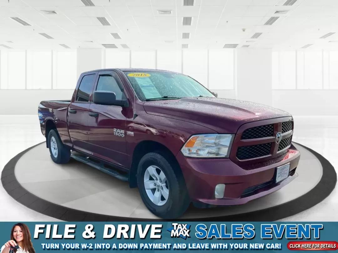 2018 Ram 1500 Express Quad Cab 4x4 6'4 Box (1C6RR7FT8JS) with an Other engine, located at 1184 Kauffman Ave, Fairborn, OH, 45324, (937) 908-9800, 39.807072, -84.030914 - Are you ready to elevate your adventures and tackle any terrain with confidence? The 2018 Ram 1500 Express Quad Cab 4x4 is the ultimate truck for weekend warriors and daily commuters alike, offering the perfect blend of power, versatility, and style. With a striking Delmonico Red Pearlcoat exterior - Photo#0