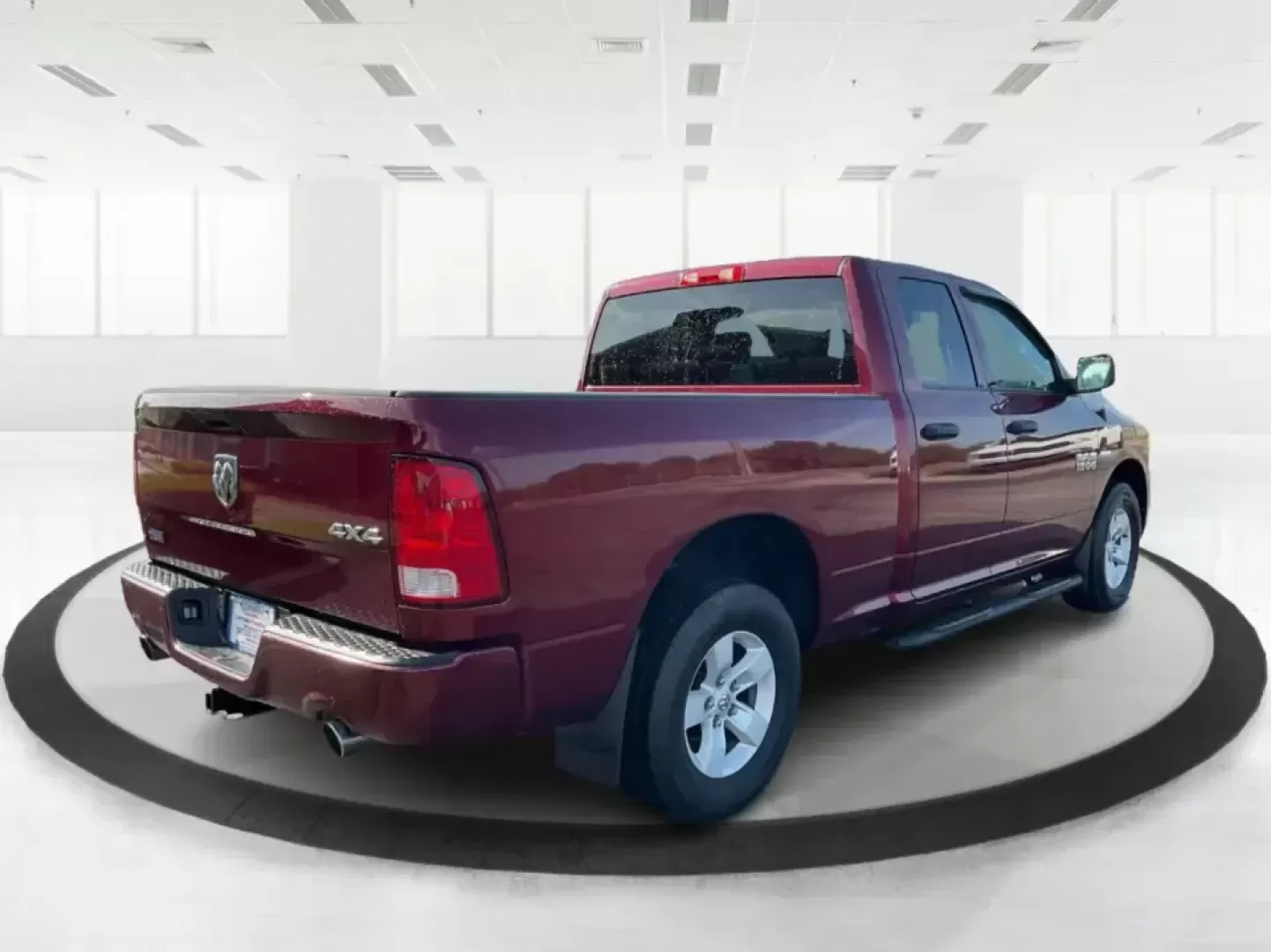 2018 Ram 1500 Express Quad Cab 4x4 6'4 Box (1C6RR7FT8JS) with an 5.7L V8 OHV 16V engine, 8A transmission, located at 8750 N County Rd 25A, Piqua, OH, 45356, (937) 908-9800, 40.164391, -84.232513 - Are you ready to elevate your adventures and tackle any terrain with confidence? The 2018 Ram 1500 Express Quad Cab 4x4 is the ultimate truck for weekend warriors and daily commuters alike, offering the perfect blend of power, versatility, and style. With a striking Delmonico Red Pearlcoat exterior - Photo#2