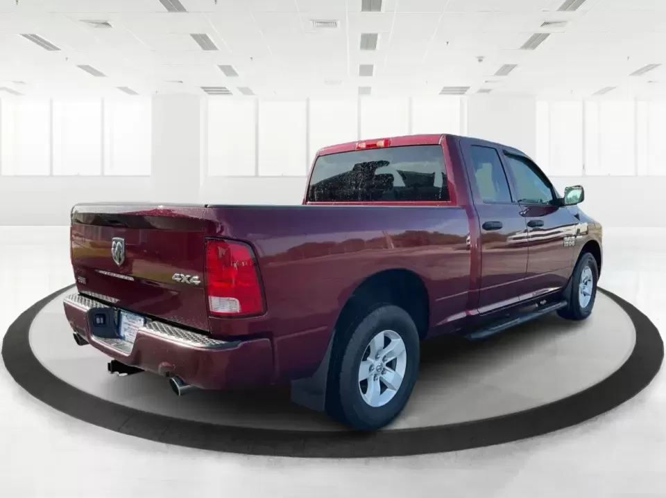 2018 Ram 1500 Express Quad Cab 4x4 6'4 Box (1C6RR7FT8JS) with an 5.7L V8 OHV 16V engine, 8A transmission, located at 8750 N County Rd 25A, Piqua, OH, 45356, (937) 908-9800, 40.164391, -84.232513 - Are you ready to elevate your adventures and tackle any terrain with confidence? The 2018 Ram 1500 Express Quad Cab 4x4 is the ultimate truck for weekend warriors and daily commuters alike, offering the perfect blend of power, versatility, and style. With a striking Delmonico Red Pearlcoat exterior - Photo#2