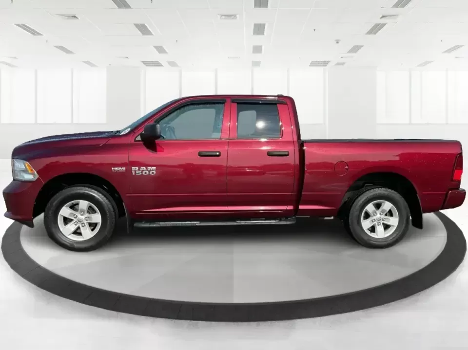 2018 Ram 1500 Express Quad Cab 4x4 6'4 Box (1C6RR7FT8JS) with an 5.7L V8 OHV 16V engine, 8A transmission, located at 8750 N County Rd 25A, Piqua, OH, 45356, (937) 908-9800, 40.164391, -84.232513 - Are you ready to elevate your adventures and tackle any terrain with confidence? The 2018 Ram 1500 Express Quad Cab 4x4 is the ultimate truck for weekend warriors and daily commuters alike, offering the perfect blend of power, versatility, and style. With a striking Delmonico Red Pearlcoat exterior - Photo#5