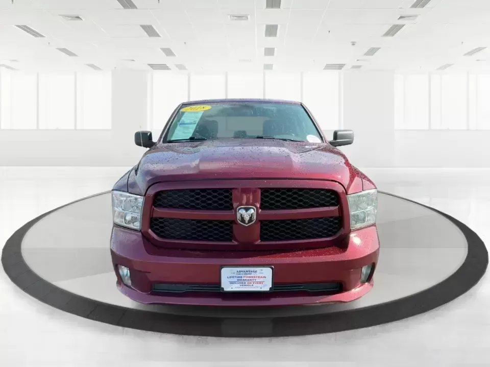 2018 Ram 1500 Express Quad Cab 4x4 6'4 Box (1C6RR7FT8JS) with an 5.7L V8 OHV 16V engine, 8A transmission, located at 8750 N County Rd 25A, Piqua, OH, 45356, (937) 908-9800, 40.164391, -84.232513 - Are you ready to elevate your adventures and tackle any terrain with confidence? The 2018 Ram 1500 Express Quad Cab 4x4 is the ultimate truck for weekend warriors and daily commuters alike, offering the perfect blend of power, versatility, and style. With a striking Delmonico Red Pearlcoat exterior - Photo#7