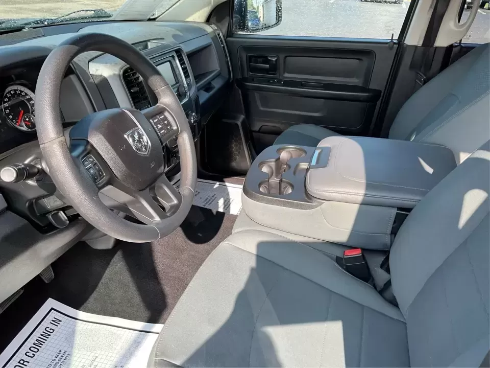 2018 Ram 1500 Express Quad Cab 4x4 6'4 Box (1C6RR7FT8JS) with an 5.7L V8 OHV 16V engine, 8A transmission, located at 8750 N County Rd 25A, Piqua, OH, 45356, (937) 908-9800, 40.164391, -84.232513 - Are you ready to elevate your adventures and tackle any terrain with confidence? The 2018 Ram 1500 Express Quad Cab 4x4 is the ultimate truck for weekend warriors and daily commuters alike, offering the perfect blend of power, versatility, and style. With a striking Delmonico Red Pearlcoat exterior - Photo#9