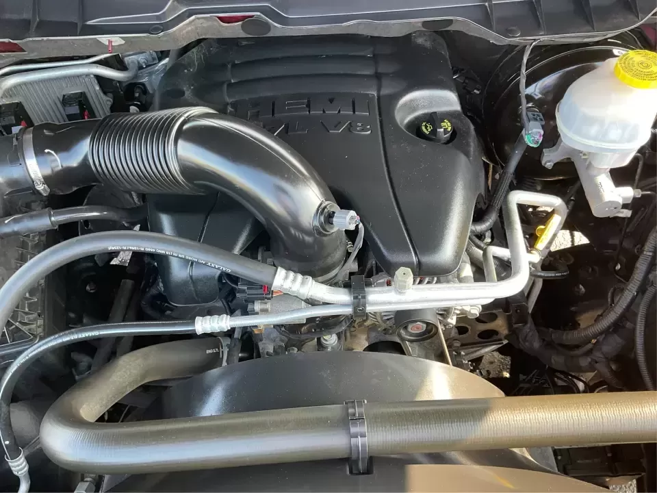 2018 Ram 1500 Express Quad Cab 4x4 6'4 Box (1C6RR7FT8JS) with an 5.7L V8 OHV 16V engine, 8A transmission, located at 8750 N County Rd 25A, Piqua, OH, 45356, (937) 908-9800, 40.164391, -84.232513 - Are you ready to elevate your adventures and tackle any terrain with confidence? The 2018 Ram 1500 Express Quad Cab 4x4 is the ultimate truck for weekend warriors and daily commuters alike, offering the perfect blend of power, versatility, and style. With a striking Delmonico Red Pearlcoat exterior - Photo#11