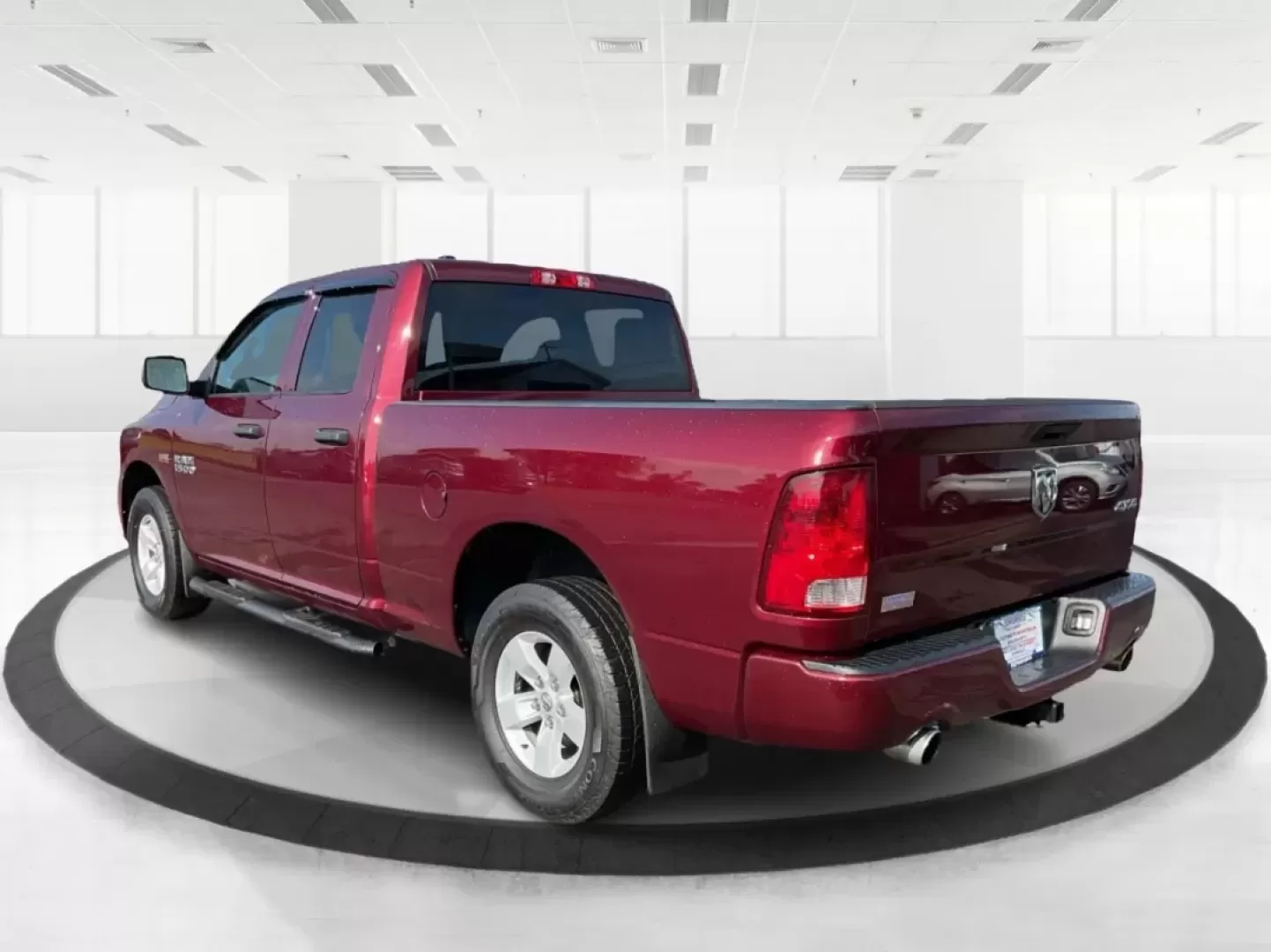 2018 Ram 1500 Express Quad Cab 4x4 6'4 Box (1C6RR7FT8JS) with an Other engine, located at 8750 N County Rd 25A, Piqua, OH, 45356, (937) 908-9800, 40.164391, -84.232513 - Are you ready to elevate your adventures and tackle any terrain with confidence? The 2018 Ram 1500 Express Quad Cab 4x4 is the ultimate truck for weekend warriors and daily commuters alike, offering the perfect blend of power, versatility, and style. With a striking Delmonico Red Pearlcoat exterior - Photo#4