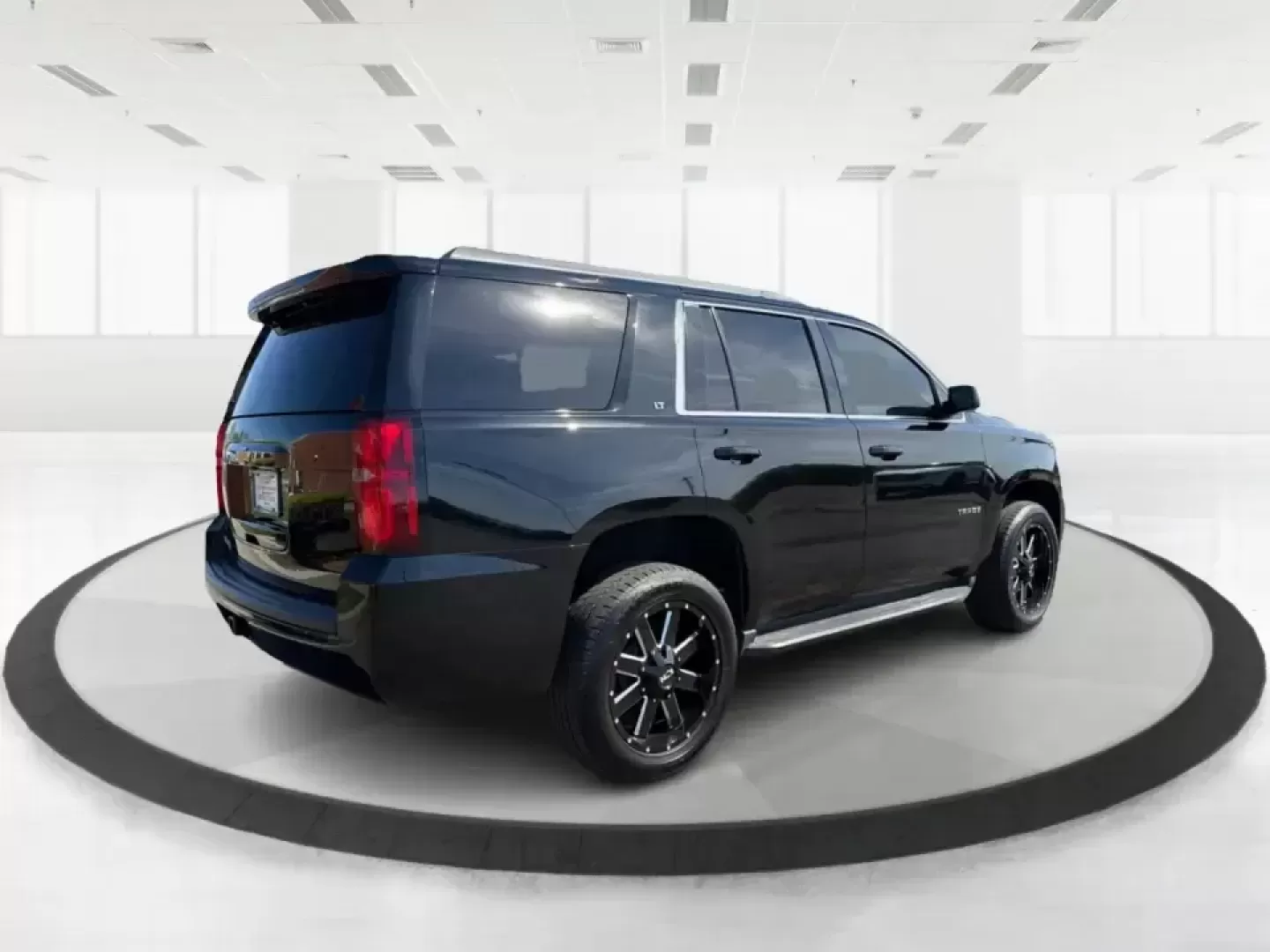 2015 Chevrolet Tahoe LT (1GNSKBKC1FR) with an EcoTec3 5.3L V-8 gasoline direct injection engine, 6-Speed Automatic transmission, located at 8750 N County Rd 25A, Piqua, OH, 45356, (937) 908-9800, 40.164391, -84.232513 - Big weekends, big families, and big Ohio road trips call for a full-size SUV that can handle it all-and this **2015 Chevrolet Tahoe LT 4WD** is built for exactly that lifestyle. Whether you're loading up for a day at **Indian Lake**, hauling sports gear across town, or cruising I75 for a long commut - Photo#2