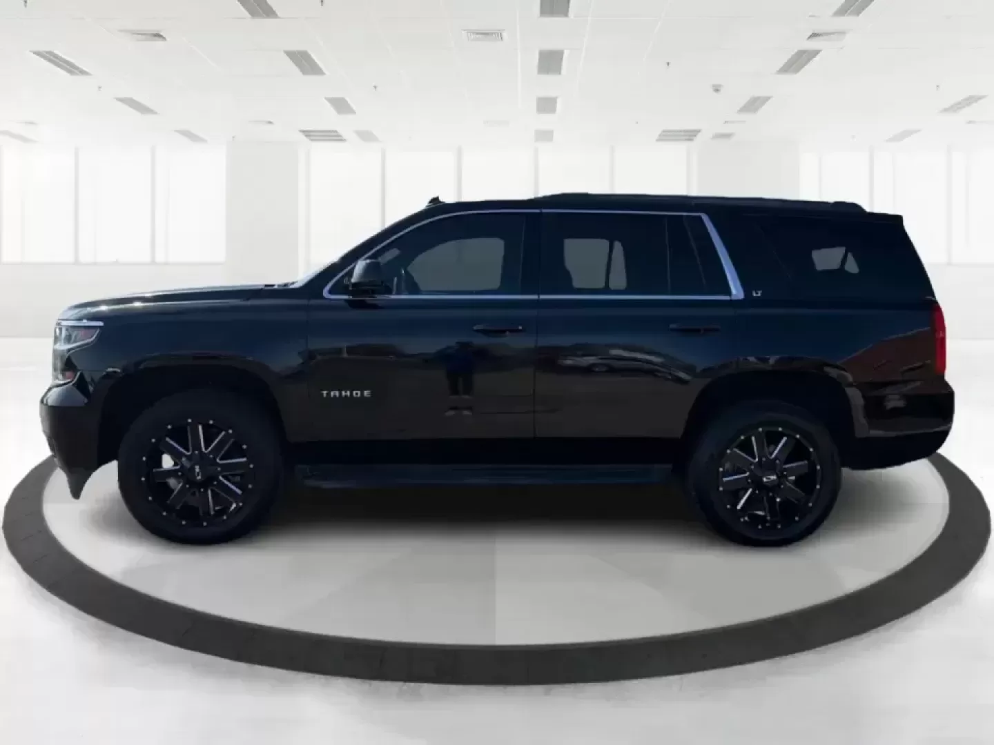 2015 Chevrolet Tahoe LT (1GNSKBKC1FR) with an EcoTec3 5.3L V-8 gasoline direct injection engine, 6-Speed Automatic transmission, located at 8750 N County Rd 25A, Piqua, OH, 45356, (937) 908-9800, 40.164391, -84.232513 - Big weekends, big families, and big Ohio road trips call for a full-size SUV that can handle it all-and this **2015 Chevrolet Tahoe LT 4WD** is built for exactly that lifestyle. Whether you're loading up for a day at **Indian Lake**, hauling sports gear across town, or cruising I75 for a long commut - Photo#5
