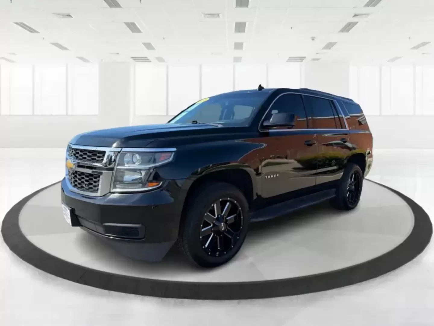 2015 Chevrolet Tahoe LT (1GNSKBKC1FR) with an EcoTec3 5.3L V-8 gasoline direct injection engine, 6-Speed Automatic transmission, located at 8750 N County Rd 25A, Piqua, OH, 45356, (937) 908-9800, 40.164391, -84.232513 - Big weekends, big families, and big Ohio road trips call for a full-size SUV that can handle it all-and this **2015 Chevrolet Tahoe LT 4WD** is built for exactly that lifestyle. Whether you're loading up for a day at **Indian Lake**, hauling sports gear across town, or cruising I75 for a long commut - Photo#8