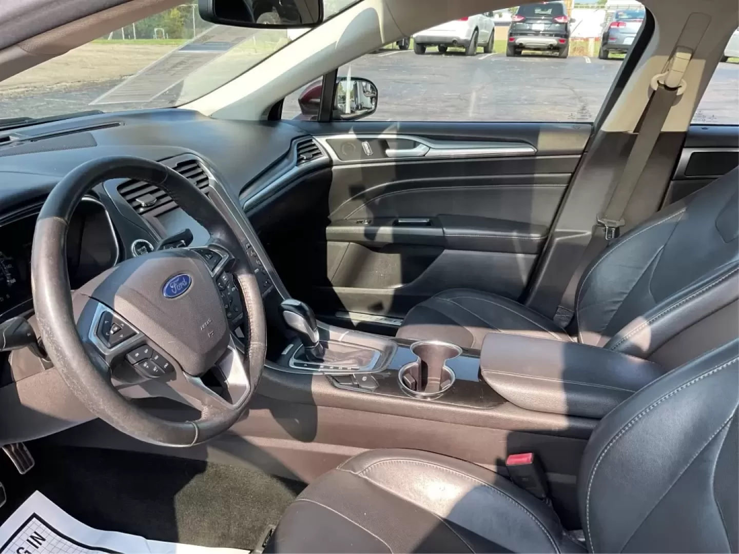 2016 Ford Fusion Titanium (3FA6P0K92GR) with an EcoBoost 2L I-4 gasoline direct injection engine, located at 8750 N County Rd 25A, Piqua, OH, 45356, (937) 908-9800, 40.164391, -84.232513 - **Elevate Your Driving Experience with the 2016 Ford Fusion Titanium Where Style Meets Functionality!**<br /> <br /> Are you searching for the perfect blend of style, comfort, and advanced technology for your daily commute or weekend getaways? Look no further than the stunning 2016 Ford Fusion Tita - Photo#9