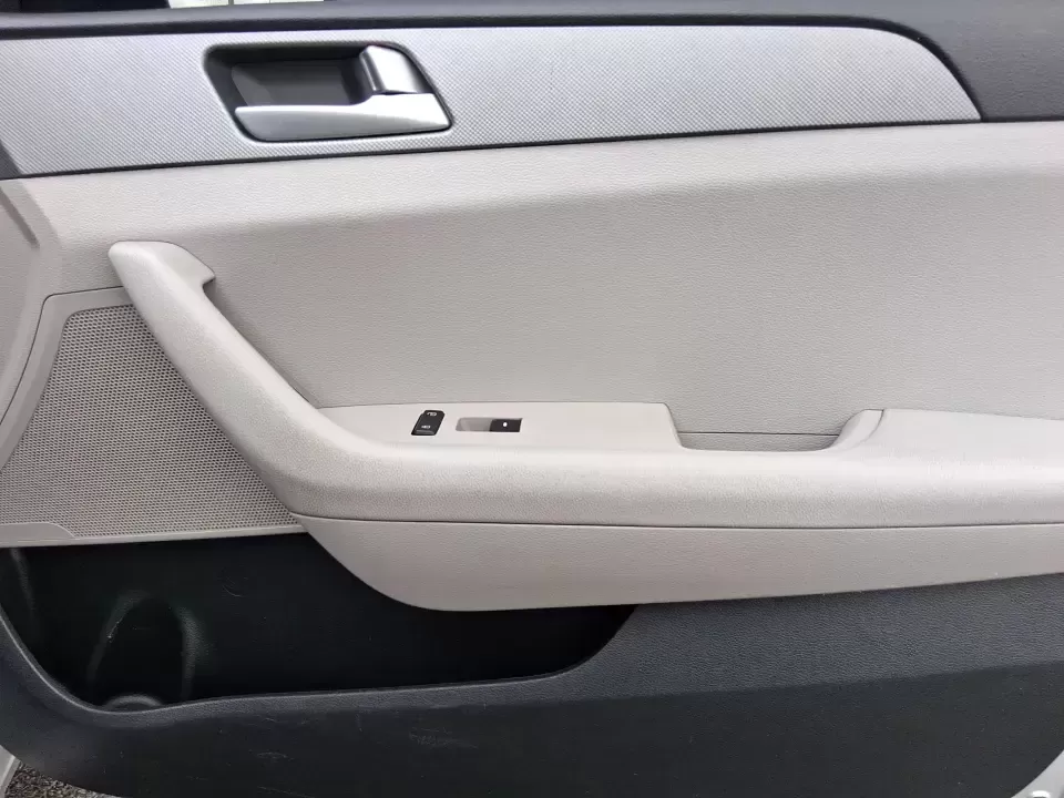 2015 Hyundai Sonata SE (5NPE24AFXFH) with an 2.4L L4 DOHC 16V engine, 7-Speed Automatic transmission, located at 1099 N County Rd 25A , Troy, OH, 45373, (937) 908-9800, 40.057079, -84.212883 - Need a dependable daily commuter that still feels comfortable for weekend getaways to Dayton, Tipp City, or a quick escape to Charleston Falls Preserve? This 2015 Hyundai Sonata SE in Symphony Silver is a smart, budget-friendly sedan that fits real life in Troy, Ohio-easy to park downtown, smooth on - Photo#18