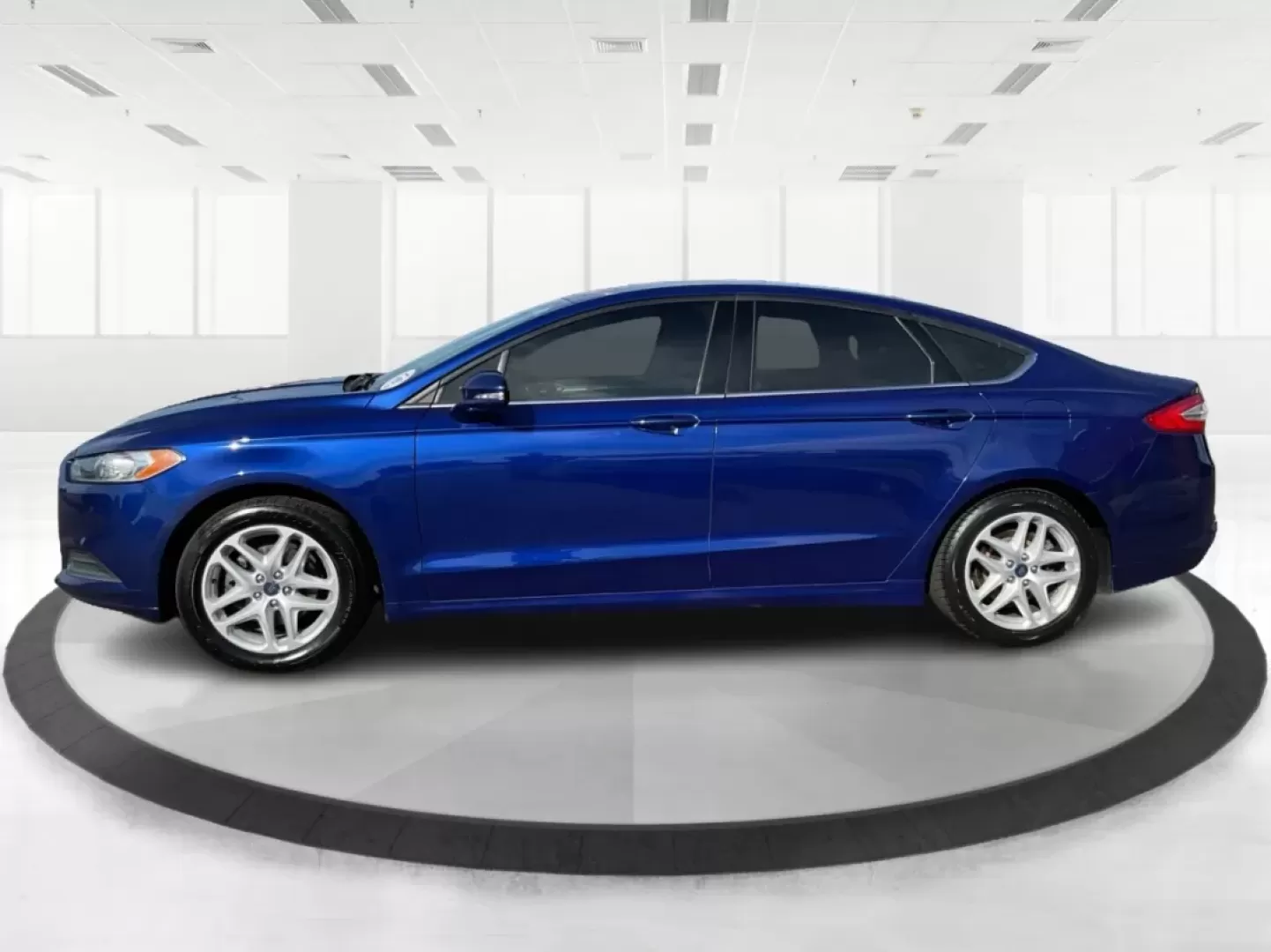 2014 Ford Fusion SE (3FA6P0H78ER) with an Other engine, located at 1184 Kauffman Ave, Fairborn, OH, 45324, (937) 908-9800, 39.807072, -84.030914 - **Experience the Perfect Blend of Style and Reliability with the 2014 Ford Fusion SE**<br /> <br /> Are you in search of a dependable sedan that seamlessly balances style, comfort, and performance for your daily commute or weekend adventures? Look no further than the 2014 Ford Fusion SE, available n - Photo#5