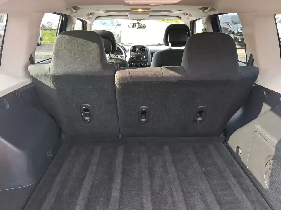 2012 Jeep Patriot Latitude (1C4NJRFB1CD) with an 2.4L I-4 DOHC engine, Automatic transmission, located at 8750 N County Rd 25A, Piqua, OH, 45356, (937) 908-9800, 40.164391, -84.232513 - Experience the thrill of adventure with the 2012 Jeep Patriot Latitude, now available at Advantage Car and Credit in Troy, OH! Perfect for weekend getaways or daily commutes, this versatile SUV is designed to meet the needs of both adventure-seekers and budget-conscious buyers alike. With its rugged - Photo#12