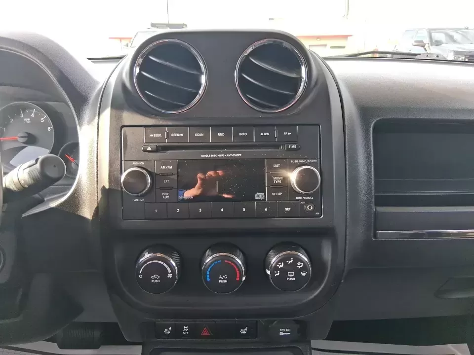 2012 Jeep Patriot Latitude (1C4NJRFB1CD) with an 2.4L I-4 DOHC engine, Automatic transmission, located at 8750 N County Rd 25A, Piqua, OH, 45356, (937) 908-9800, 40.164391, -84.232513 - Experience the thrill of adventure with the 2012 Jeep Patriot Latitude, now available at Advantage Car and Credit in Troy, OH! Perfect for weekend getaways or daily commutes, this versatile SUV is designed to meet the needs of both adventure-seekers and budget-conscious buyers alike. With its rugged - Photo#13