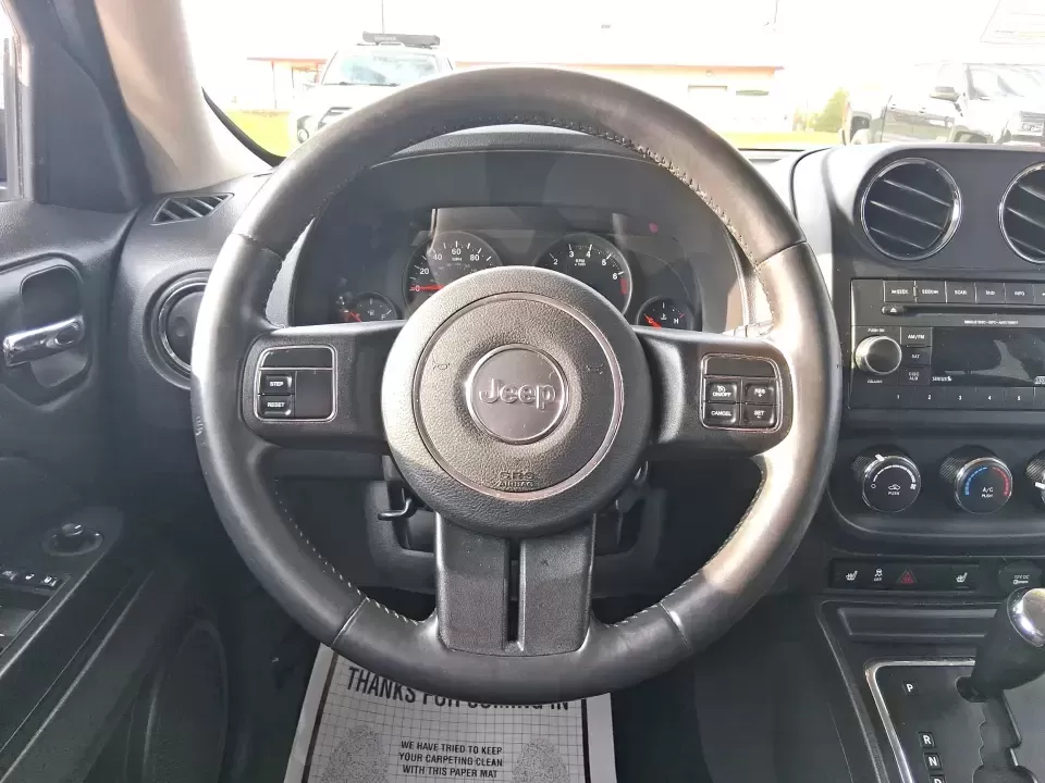 2012 Jeep Patriot Latitude (1C4NJRFB1CD) with an 2.4L I-4 DOHC engine, Automatic transmission, located at 8750 N County Rd 25A, Piqua, OH, 45356, (937) 908-9800, 40.164391, -84.232513 - Experience the thrill of adventure with the 2012 Jeep Patriot Latitude, now available at Advantage Car and Credit in Troy, OH! Perfect for weekend getaways or daily commutes, this versatile SUV is designed to meet the needs of both adventure-seekers and budget-conscious buyers alike. With its rugged - Photo#16