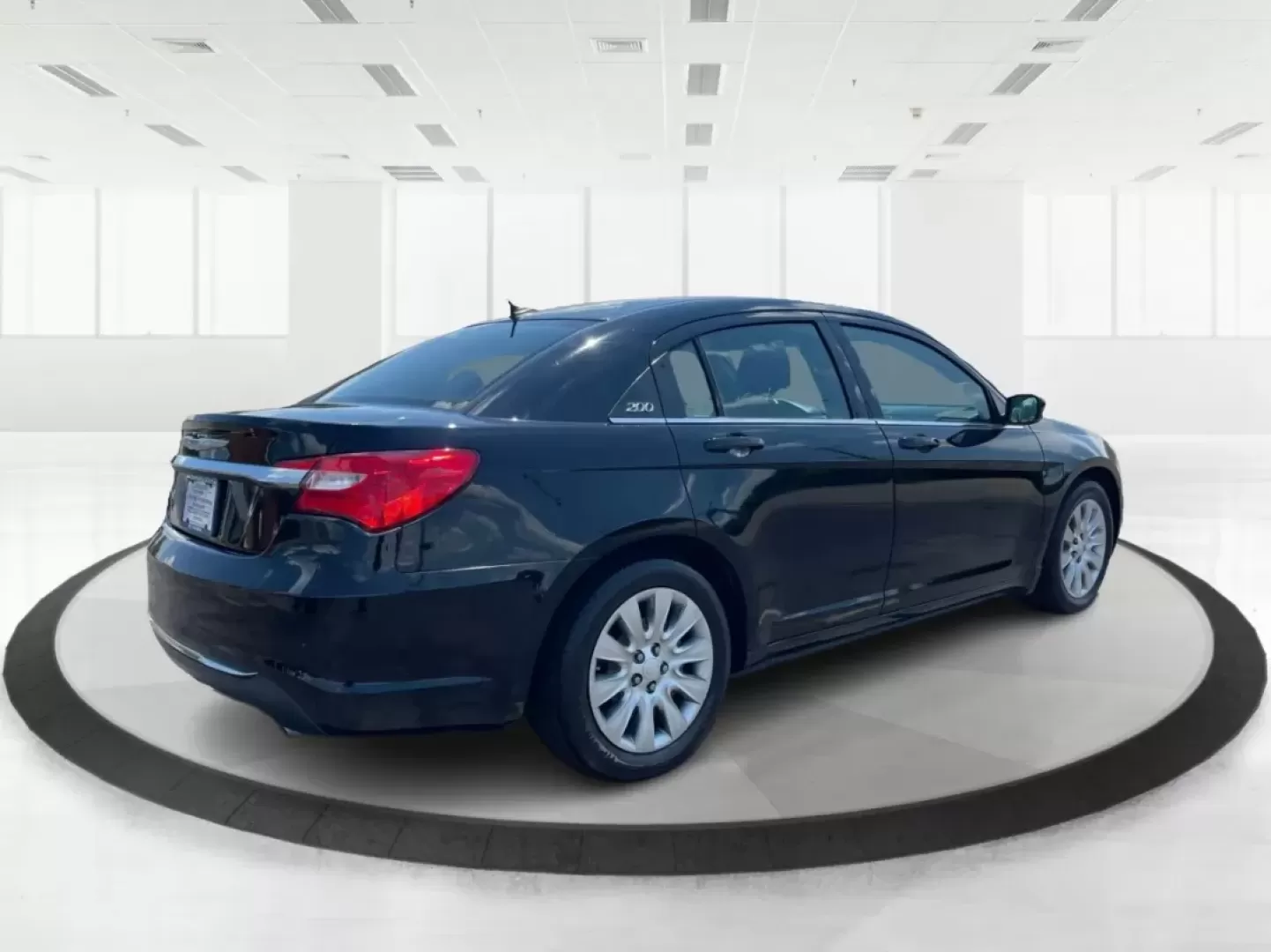 2014 Chrysler 200 LX (1C3CCBAG7EN) with an Other engine, located at 1230 East Main St, Xenia, OH, 45385, (937) 908-9800, 39.688026, -83.910172 - Are you looking for a reliable car that seamlessly fits into your busy lifestyle? Look no further than this stunning 2014 Chrysler 200 LX, available now at Advantage Car and Credit in Fairborn, OH. This stylish sedan is perfect for growing families, daily commuters, or anyone seeking a dependable ve - Photo#2