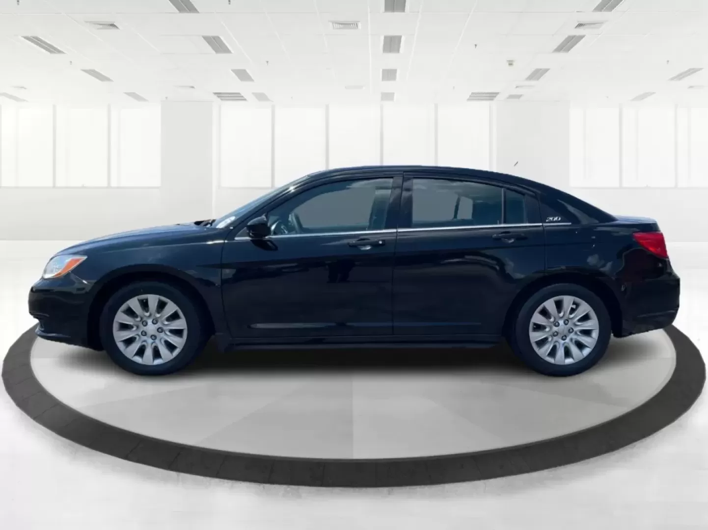 2014 Chrysler 200 LX (1C3CCBAG7EN) with an Other engine, located at 1230 East Main St, Xenia, OH, 45385, (937) 908-9800, 39.688026, -83.910172 - Are you looking for a reliable car that seamlessly fits into your busy lifestyle? Look no further than this stunning 2014 Chrysler 200 LX, available now at Advantage Car and Credit in Fairborn, OH. This stylish sedan is perfect for growing families, daily commuters, or anyone seeking a dependable ve - Photo#5