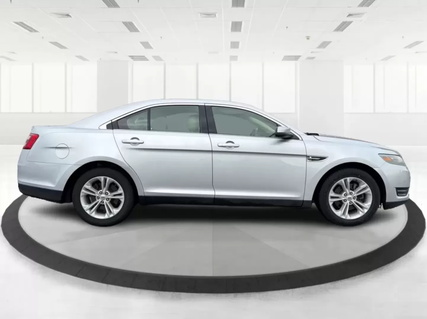 2013 Ford Taurus SEL (1FAHP2H87DG) with an 3.5L V-6 DOHC engine, 6-Speed Automatic transmission, located at 1099 N County Rd 25A , Troy, OH, 45373, (937) 908-9800, 40.057079, -84.212883 - **Discover the Perfect Family Sedan: 2013 Ford Taurus SEL at Advantage Car and Credit - Piqua, OH**<br /> <br /> Are you searching for a reliable and spacious vehicle that fits seamlessly into your family's lifestyle? Look no further than this 2013 Ford Taurus SEL, available now at Advantage Car and - Photo#1